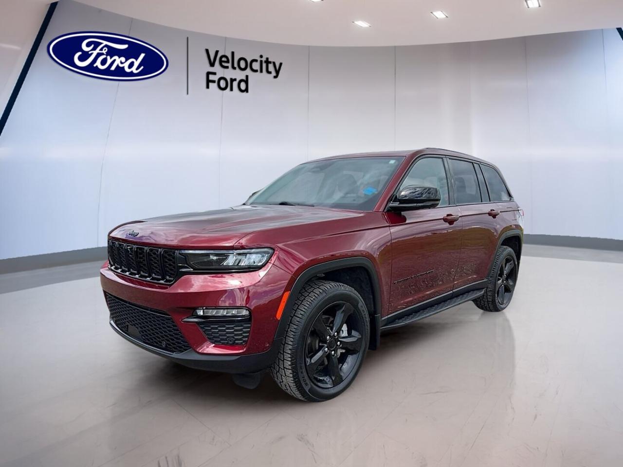 Meet the 2023 Jeep Grand Cherokee Limited 4x4, a refined used SUV built for Canadian roads and busy family life. Finished in red with a black interior, this four-door sport utility vehicle blends confident style, strong utility, and modern comfort. With 93,322 km, automatic transmission, and a 3.6-litre unleaded engine, it is ready for daily driving, highway travel, and year-round traction in Moose Jaw.

The 2023 Jeep Grand Cherokee Limited 4x4 stands out with a balanced mix of comfort, smart technology, and proven capability. This model is well equipped with heated front and rear seats, navigation, a backup camera, blind spot monitoring, and a power liftgate. Its smooth ride, practical cabin, and advanced safety features make it a strong fit for drivers who want versatility without giving up comfort.

FEATURES OF THE Grand Cherokee Limited 4x4
»» Confident four-wheel drive for all-season traction
»» Refined cabin with premium comfort touches
»» Power liftgate adds everyday loading ease
»» Heated front and rear seats included

ADVANCED SAFETY FEATURES
»» Backup camera helps with safer reversing
»» Blind spot monitor adds lane awareness
»» Lane departure warning supports highway driving
»» Side and head airbags enhance protection

PERFORMANCE AND EFFICIENCY
»» 3.6-litre unleaded engine delivers smooth power
»» Eight-speed automatic supports relaxed cruising
»» Four-wheel drive boosts grip on roads
»» Limited slip differential aids traction control

COMFORT AND CONVENIENCE
»» Dual-zone climate control keeps comfort balanced
»» Heated mirrors help during cold mornings
»» Remote starter adds winter driving convenience
»» Memory seats personalize your driving position

TECHNOLOGY AND CONNECTIVITY
»» Navigation system guides every trip clearly
»» Bluetooth integration supports hands-free calling
»» Wi-Fi hotspot helps keep devices connected
»» Steering wheel audio controls simplify access

CARGO SPACE
»» Power liftgate makes loading more convenient
»» Rear trunk access supports daily practicality
»» Four-door layout helps passenger entry ease
»» Spare tire adds peace of mind

AWARDS & RECOGNITIONS
»» Top Safety Pick, Insurance Institute for Highway Safety, 2023

WHAT OTHER OWNERS LIKE
»» Smooth ride quality for daily travel
»» User-friendly infotainment and navigation system
»» Comfortable seating for long road trips
»» Confident winter traction with four-wheel drive

This 2023 Jeep Grand Cherokee Limited 4x4 also includes cruise control, power steering, anti-lock braking system, stability control, child safety locks, power windows, front air conditioning, adjustable steering wheel, rear spoiler, tinted windows, satellite radio, automatic headlights, ambient lighting package, push button start, fog lights, tire pressure monitoring, power driver seat, power passenger seat, HD Radio, turn signal mirrors, rear window defroster, LED headlamps, and memory mirrors.

The red exterior gives this SUV a bold road presence, while the black interior keeps the cabin clean and timeless. For drivers shopping at Velocity Ford in Moose Jaw, this used 2023 Jeep Grand Cherokee Limited 4x4 offers the comfort, safety, and capability expected from a well-equipped midsize SUV.

This 2023 Jeep Grand Cherokee Limited 4x4s VIN is: 1C4RJHBG0PC652185.