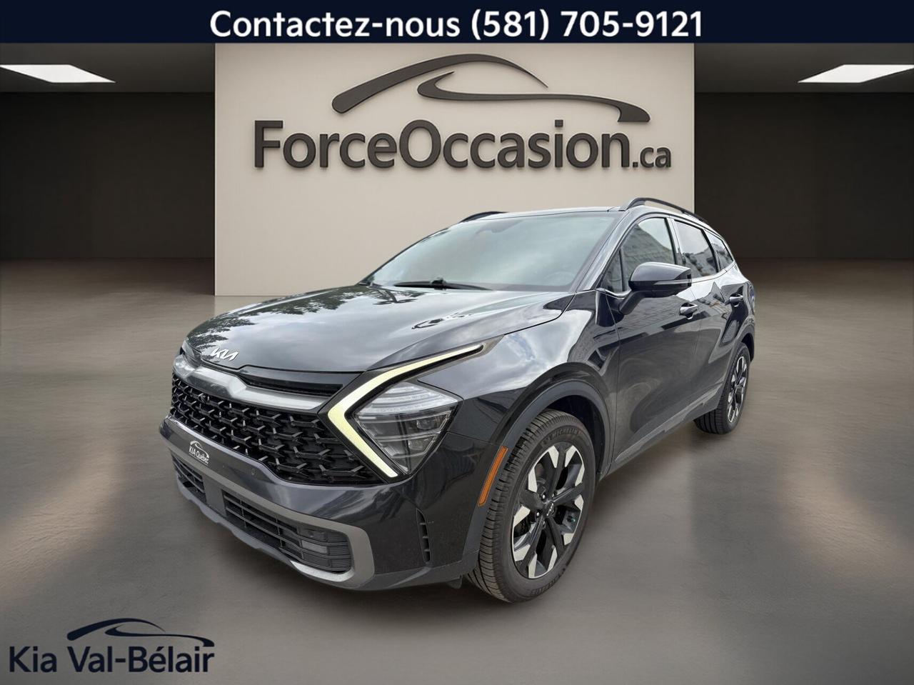 Jamais accidentée // Inspecté en 135 points

Le Kia Sportage 2023 X-Line Limited proposé par Kia Val-Bélair à Québec se distingue par sa présentation noire sur noir, son rouage intégral AWD et son moteur 2,5L à essence jumelé à une transmission automatique. Avec 104 840 km à lodomètre, ce VUS usagé mise sur un équipement riche, axé sur le confort, la sécurité et la vie à bord.

CARACTÉRISTIQUES DU SPORTAGE X-LINE LIMITED * AWD * CUIR * TOIT * BI-ZONE * HARMAN KARDON *
»» Rouage intégral AWD pour meilleure motricité
»» Toit panoramique avec section ouvrante en verre
»» Climatisation automatique à deux zones
»» Système audio Harman Kardon mentionné à léquipement

CARACTÉRISTIQUES DE SÉCURITÉ AVANCÉES
»» Avertissement de sortie de voie inclus
»» Surveillance des angles morts intégrée
»» Caméra de recul pour manoeuvres précises
»» Contrôle de stabilité et freins ABS

PERFORMANCE ET EFFICACITÉ
»» Moteur 2,5 litres à essence
»» Transmission automatique à 8 vitesses
»» Direction assistée pour conduite quotidienne
»» Rouage intégral AWD pour routes variées

CONFORT
»» Sièges avant chauffants pour lhiver
»» Sièges arrière chauffants inclus
»» Siège conducteur à réglage électrique
»» Siège passager électrique et mémoire conducteur

TECHNOLOGIE ET CONNECTIVITÉ
»» Intégration Bluetooth pour appels et audio
»» Système de navigation GPS intégré
»» Commandes audio directement au volant
»» Démarrage par bouton-poussoir pratique

ESPACE DE CHARGEMENT
»» Hayon électrique pour accès simplifié
»» Accès au coffre arrière pratique
»» Banquette arrière utile au quotidien
»» Format VUS polyvalent pour usage familial

RÉCOMPENSES ET RECONNAISSANCES
»» Top Safety Pick, Insurance Institute for Highway Safety, 2023

APPRÉCIÉ DES AUTRES PROPRIÉTAIRES
»» Habitacle moderne et facile à utiliser
»» Confort appréciable sur longs trajets
»» Visibilité arrière aidée par la caméra
»» Équipement complet pour usage quotidien

GARANTIE
»» Garantie légale seulement
»» Garantie dusage
»» Garantie de durée raisonnable
»» Garantie contre les vices cachés

Ce Kia Sportage 2023 X-Line Limited offre une combinaison recherchée de rouage intégral, déquipements haut de gamme et de commodités utiles au quotidien. On y retrouve notamment le démarreur à distance, les rétroviseurs chauffants, les vitres électriques, les phares à DEL, le régulateur de vitesse, les vitres teintées et le toit panoramique, dans une présentation soignée et actuelle.

À bord, lenvironnement noir met laccent sur une ambiance sobre et élégante. Le conducteur profite dun volant réglable gainé de cuir, dun support lombaire, dun rétroviseur intérieur électrochromatique et dun contrôle de climatisation à deux zones. Les occupants bénéficient aussi de plusieurs éléments pratiques, comme les miroirs de courtoisie éclairés, les serrures de sécurité enfant et le verrouillage automatique des portes.

Pour la conduite de tous les jours à Québec et sur les routes de la région, ce VUS propose des caractéristiques concrètes et utiles, sans compromis inutile. Son kilométrage démontre quil a déjà servi, mais son niveau déquipement demeure très intéressant pour un acheteur qui cherche un modèle bien doté, avec AWD, sièges chauffants avant et arrière, navigation, Bluetooth et plusieurs aides à la conduite.

Le NIV de ce Kia Sportage X-Line Limited * AWD * CUIR * TOIT * BI-ZONE * HARMAN KARDON * 2023 est le KNDPXCAFXP7042210 .

Garantie prolongée disponible, livraison en 48h