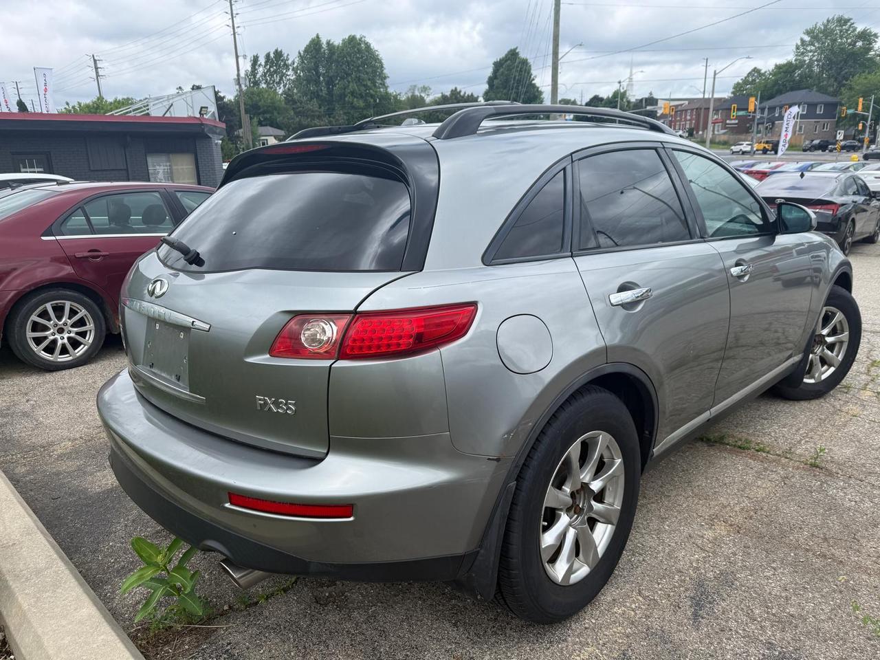 2008 Infiniti FX35 BASE / AUTO / LEATHER / YOU SAFETY YOU SAVE Photo