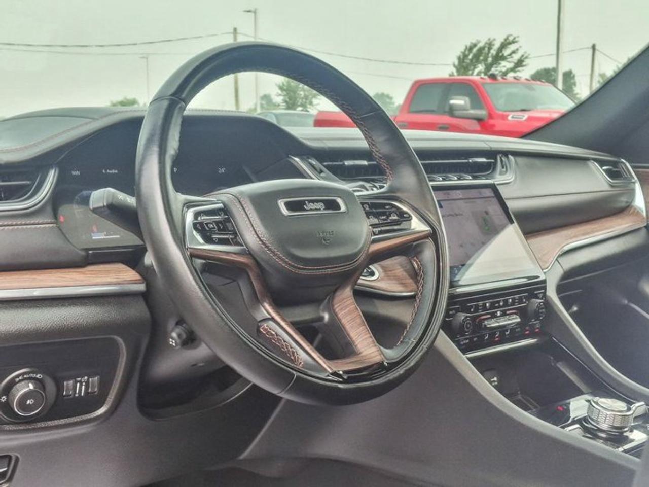 2023 Jeep Grand Cherokee Summit 4x4 | Leather | Pano Sunroof | Rear Entertainment | Heads Up Display | BSM | and More ! Photo