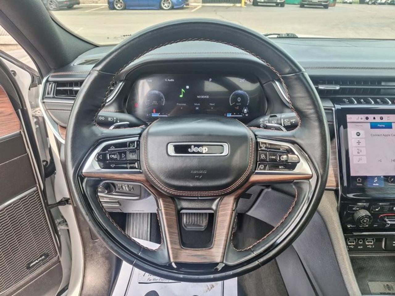 2023 Jeep Grand Cherokee Summit 4x4 | Leather | Pano Sunroof | Rear Entertainment | Heads Up Display | BSM | and More ! Photo