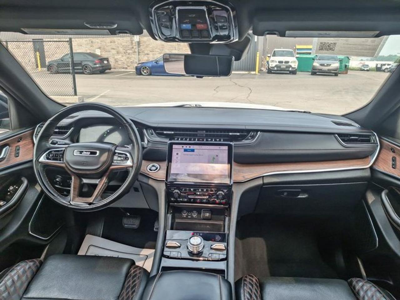 2023 Jeep Grand Cherokee Summit 4x4 | Leather | Pano Sunroof | Rear Entertainment | Heads Up Display | BSM | and More ! Photo