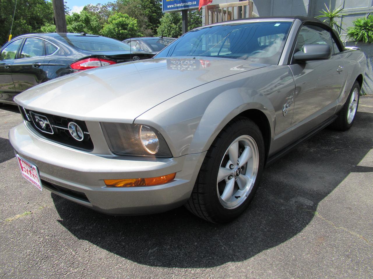 <p>All of our cars come with a 6 month limited warranty that pays the first $1000 of a repair. It covers engine, transmission, seals and gaskets.</p><p>Step into automotive legend with this stunning 2009 Ford Mustang 45th Anniversary edition, now available at Five Star Auto. This iconic coupe, finished in a sophisticated gray exterior with a matching gray interior, is more than just a car; its a piece of American muscle heritage ready to hit the road. Imagine cruising down the highway, the rumble of its 6-cylinder engine a satisfying soundtrack to your journey, all while enjoying the smooth performance of the automatic transmission.</p><p>This particular Mustang carries the spirit of its anniversary designation, a testament to a legacy of performance and style. While it boasts 220,000 kilometers, this vehicle has been meticulously maintained and is eager to continue its adventure with a new owner. Its a rare opportunity to own a vehicle that blends timeless design with a powerful driving experience, perfect for enthusiasts and everyday drivers alike who appreciate a car with character.</p><p>Here are five features that make this 2009 Ford Mustang 45th Anniversary a truly special find:</p><ul><li><strong>45th Anniversary Edition:</strong> Own a piece of Mustang history with this exclusive commemorative model, signifying a milestone in the legendary pony cars lineage.</li><li><strong>Iconic Coupe Design:</strong> Turn heads with the classic, muscular silhouette of the Mustang coupe, a timeless design that never goes out of style.</li><li><strong>Smooth Automatic Transmission:</strong> Experience effortless driving and effortless power delivery with the responsive automatic transmission, making every drive a pleasure.</li><li><strong>Rear Wheel Drive Performance:</strong> Feel the pure, exhilarating connection to the road that only rear-wheel drive can deliver, perfect for spirited driving.</li><li><strong>Comfortable Gray Interior:</strong> Settle into a refined and comfortable cabin with the stylish gray interior, offering a classic and enduring aesthetic.</li></ul><p><strong><em>Powered by AutoIntelligence&trade;</em></strong></p><p>Vehicle information has been generated using artificial intelligence and is provided for informational purposes only. While efforts are made to ensure accuracy, please confirm all details directly with the dealer.</p>