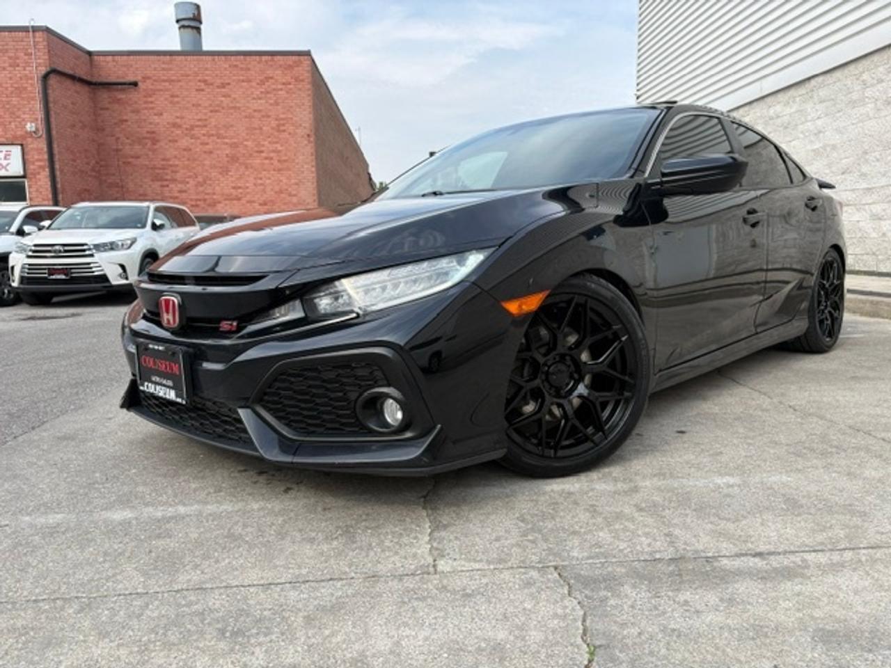 <p>Looking for a sporty, reliable, and fun-to-drive sedan that stands out from the crowd? This 2019 Honda Civic Si delivers the perfect combination of performance, style, and everyday practicality. Powered by a responsive 1.5L turbocharged 4-cylinder engine producing 205 HP and 192 lb-ft of torque, paired with a smooth and engaging 6-speed manual transmission and limited-slip differential, this Si offers an exhilarating driving experience every time you get behind the wheel. Featuring aggressive styling with brand new sleek blacked-out sporty rims on brand new tires<span id=jodit-selection_marker_1780680733109_5487785276504372 style=line-height: 0; display: none; data-jodit-selection_marker=start></span>, sport-tuned suspension, LED headlights and daytime running lights, power sunroof, heated Si sport seats, push-button start, smart key entry, dual-zone climate control, premium touchscreen infotainment system with Apple CarPlay and Android Auto, Bluetooth connectivity, premium audio system, backup camera, Honda LaneWatch blind spot camera, adaptive cruise control, lane keep assist, collision mitigation braking system, and USB connectivity. Well-maintained and known for Hondas legendary reliability, fuel efficiency, and strong resale value, this Civic Si is the perfect choice for enthusiasts and daily drivers alike. </p><p><br></p><p><br></p><p>{ CERTIFIED PRE-OWNED }</p><br><p>**THIS VEHICLE COMES FULLY CERTIFIED WITH A SAFETY CERTIFICATE & SERVICED AT NO EXTRA COST**</p><br><p>**$0 DOWN...PRIME RATE FINANCING APPROVALS**o.a.c.</p><br><p>WE CAN FINANCE INTERNATIONAL STUDENTS, NEW IMMIGRANTS, WORK PERMITS, #9 SIN, AND PR RESIDENTS!</p><br><p>#BEST DEAL IN TOWN! WHY PAY MORE ANYWHERE ELSE?</p><br><p>SPECIAL FINANCE PRICE! $0 DOWN 6.99% FINANCING AVAILABLE o.a.c</p><br><p>$19,999 plus HST price is available exclusively for finance purchase only.  </p>  <br><p>Wholesale dealer-to-dealer transactions & **Cash payment**  price is $21,999 plus HST</p><br><p>CARFAX IS AVAILABLE ON OUR WEBSITE FOR FREE. PLEASE VISIT</p><p>WWW.COLISEUMAUTO.CA</p><br><p>FINANCING, GAP INSURANCE COVERAGE & EXTENDED WARRANTIES AVAILABLE ON ALL VEHICLES! </p><br><p>COLISEUM AUTO SALES ON WESTON </p><p>301 WESTON ROAD </p><p>TORONTO, ON M6N 3P1 </p><br><p>4 1 6 - 7 6 6 - 2 2 7 7</p><br><p><br></p>