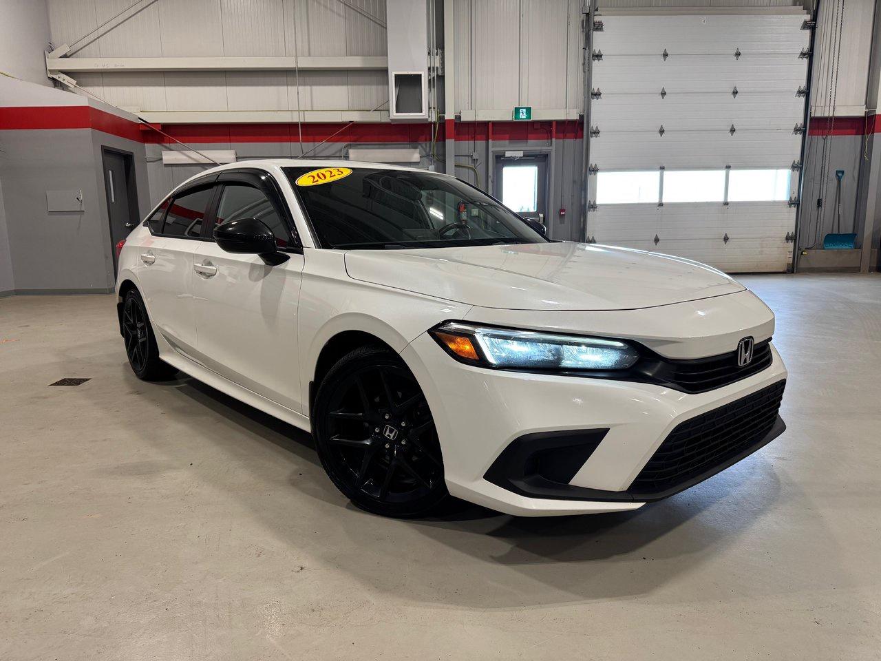 <span>The Honda Civic is part of Canadas automotive heritage. The first Civic arrived in Canada nearly five decades ago. Its been built in Canada for nearly four decades. Its been Canadas best-selling car over the last quarter-century. You cant separate Canadas vehicular landscape from the Honda Civic.</span>




<span>The Civic is a legend, yet this 2023 Honda Civic is also a class-leading, award-winning, critically acclaimed, modern and high-tech sports sedan. This 2023 Honda Civic Sport is a perfect symbol of what makes the 11th-generation Civic so great, exemplified by upmarket content like a sunroof, rain-sensing wipers, dual-zone automatic climate control, and proximity access/pushbutton start. There are also heated front seats, a heated steering wheel, &nbsp;auto high beams, blind spot monitoring, and Honda Sensing (adaptive cruise, lane keeping assist, etc.), and a 7-inch centre screen with Apple CarPlay/Android Auto. Key upgrades in the Civic Sport include 18-inch alloys, unique exterior treatments, and leather-bolstered seats.</span>




<span style=font-weight: 400;>Thank you for your interest in this vehicle. Its located at Centennial Honda, 515 Central Street, Summerside, PEI. We look forward to hearing from you; call us at 1-902-436-9158.</span>