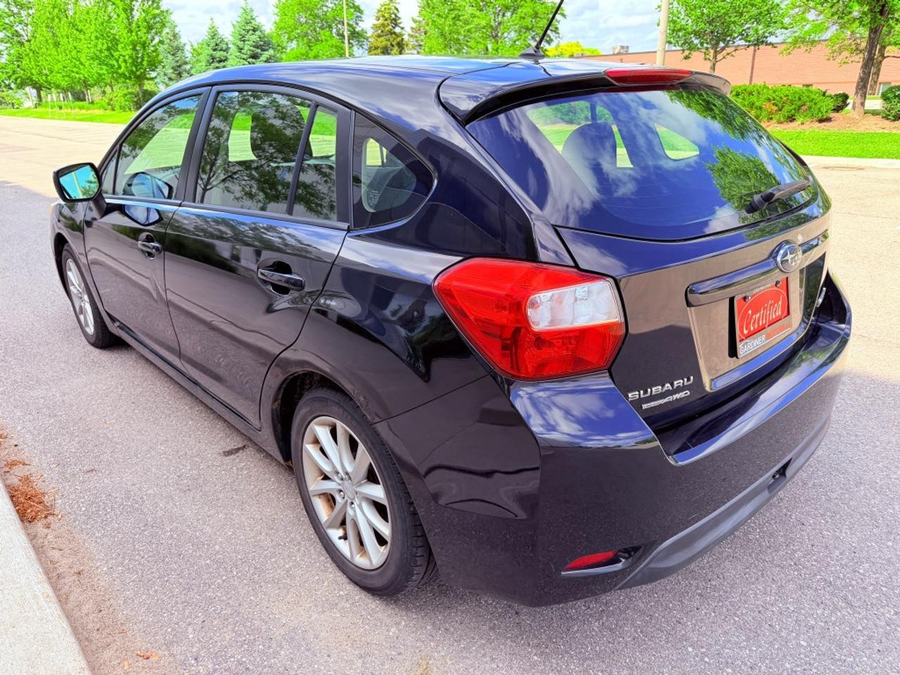 2013 Subaru Impreza 4dr Sedan  2.0i w/Touring Pkg Photo