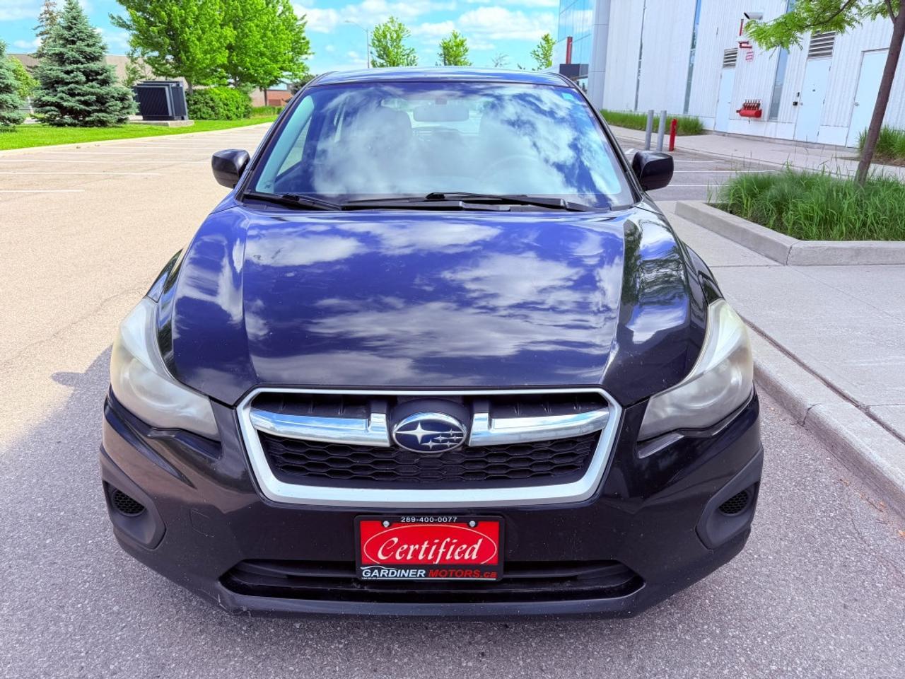 2013 Subaru Impreza 4dr Sedan  2.0i w/Touring Pkg Photo