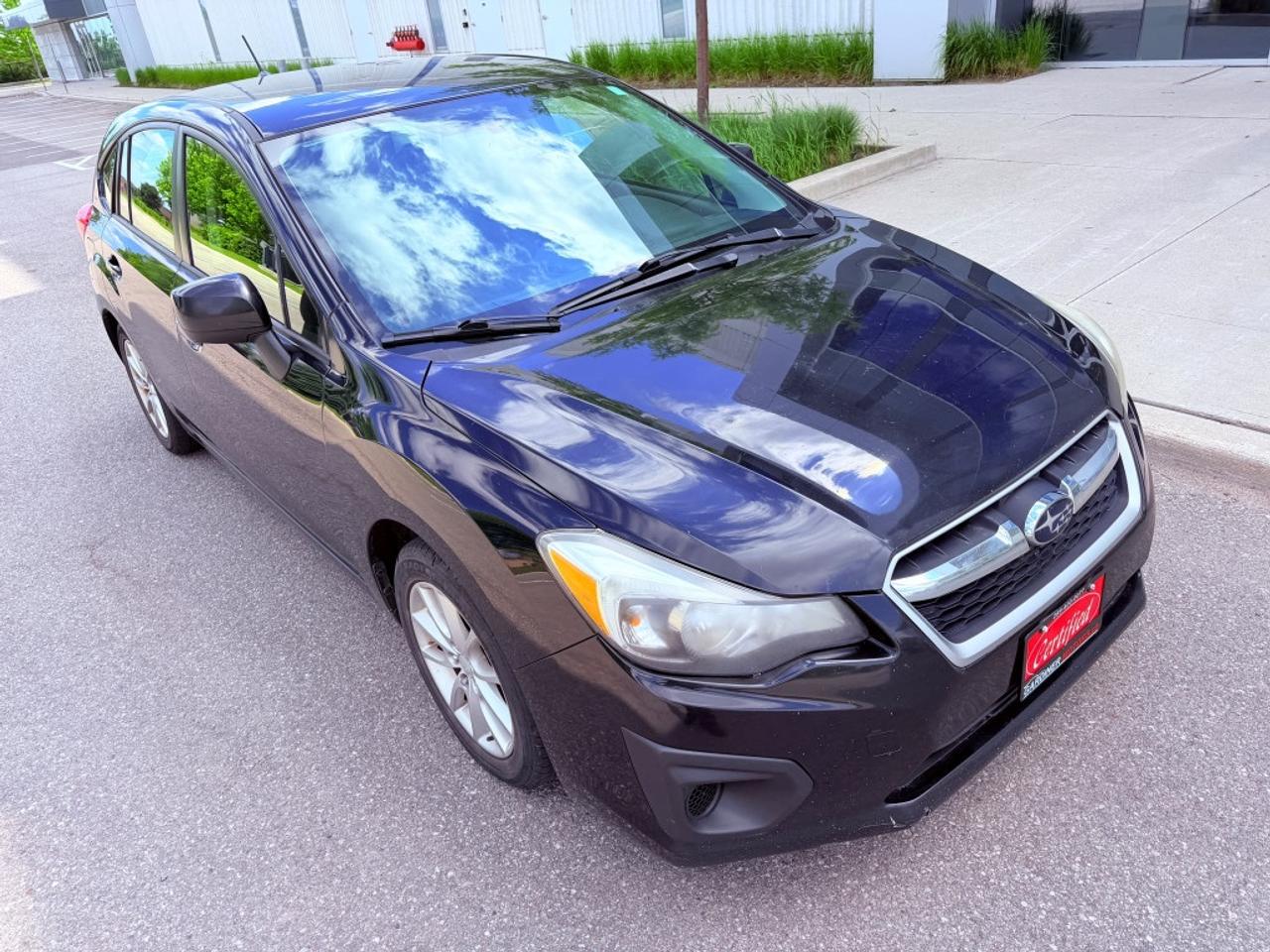 2013 Subaru Impreza 4dr Sedan  2.0i w/Touring Pkg Photo