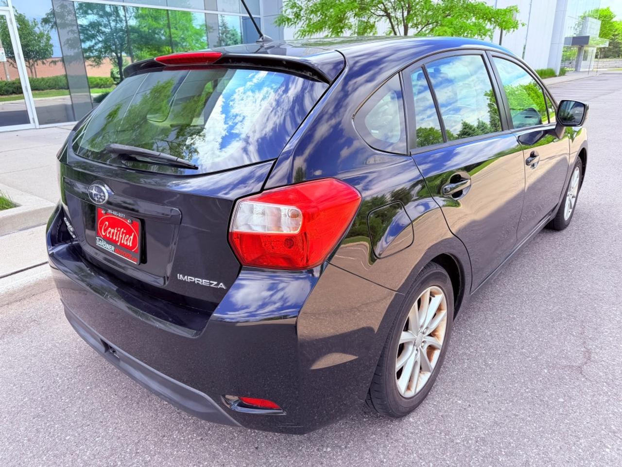 2013 Subaru Impreza 4dr Sedan  2.0i w/Touring Pkg Photo