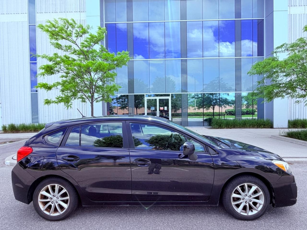 2013 Subaru Impreza 4dr Sedan  2.0i w/Touring Pkg Photo