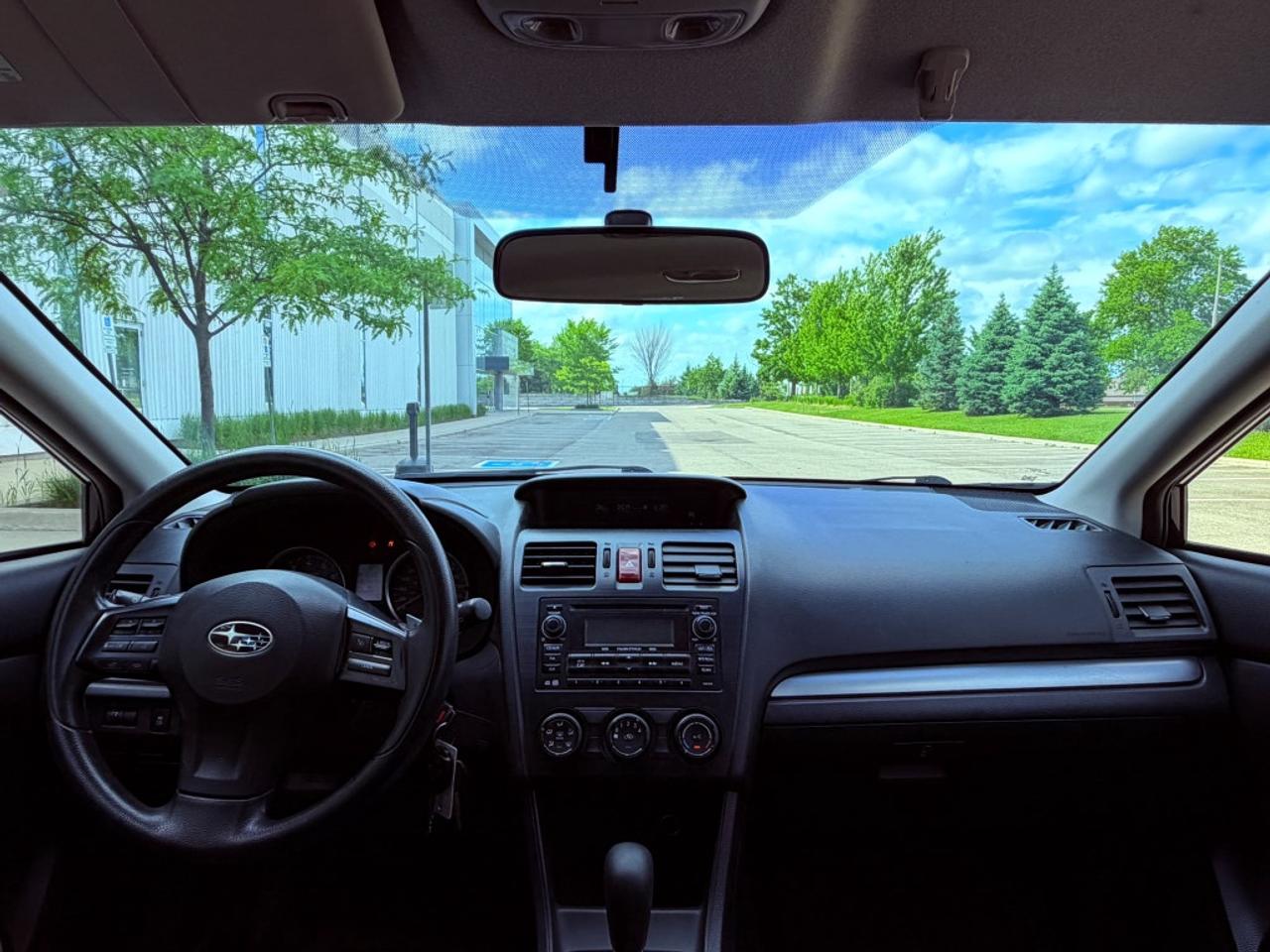 2013 Subaru Impreza 4dr Sedan  2.0i w/Touring Pkg Photo