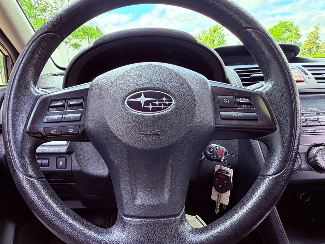 2013 Subaru Impreza 4dr Sedan  2.0i w/Touring Pkg Photo