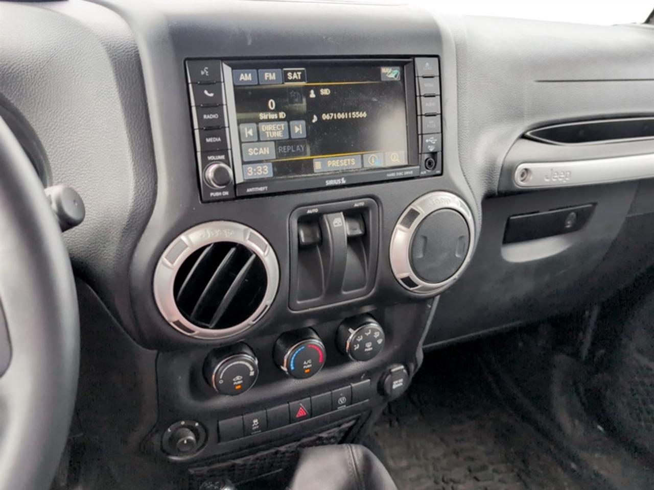 2015 Jeep Wrangler Sahara  **LOW KMS - CLEAN CARFAX** Photo