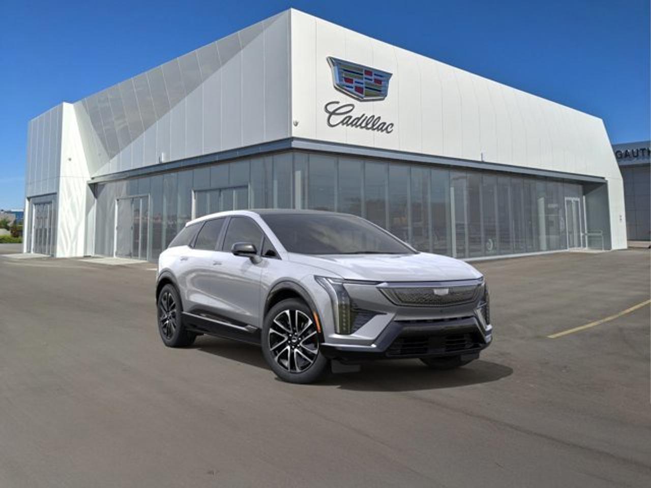 The 2026 Cadillac OPTIQ Premium Sport is a luxury all-electric SUV that blends athletic styling, advanced technology, and impressive everyday versatility. Its refined cabin features premium materials, a sweeping 33-inch LED display, Google built-in compatibility, and a premium audio system for a connected and immersive driving experience. Dual-motor all-wheel drive, responsive electric performance, and a comprehensive suite of driver-assistance technologies help deliver confident handling and comfort on every journey.