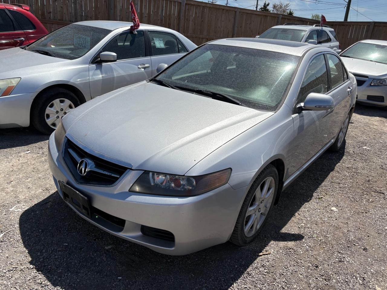 2004 Acura TSX. Silver exterior, and black leather interior. The vehicle has odometer is 279,014km and runs and drives with no engine light on. There is some rust on rear quarter panels and hood as seen in pics. The vehicle is sold as is and may require additional work. We do not perform mechanical checks or provide safety inspections.