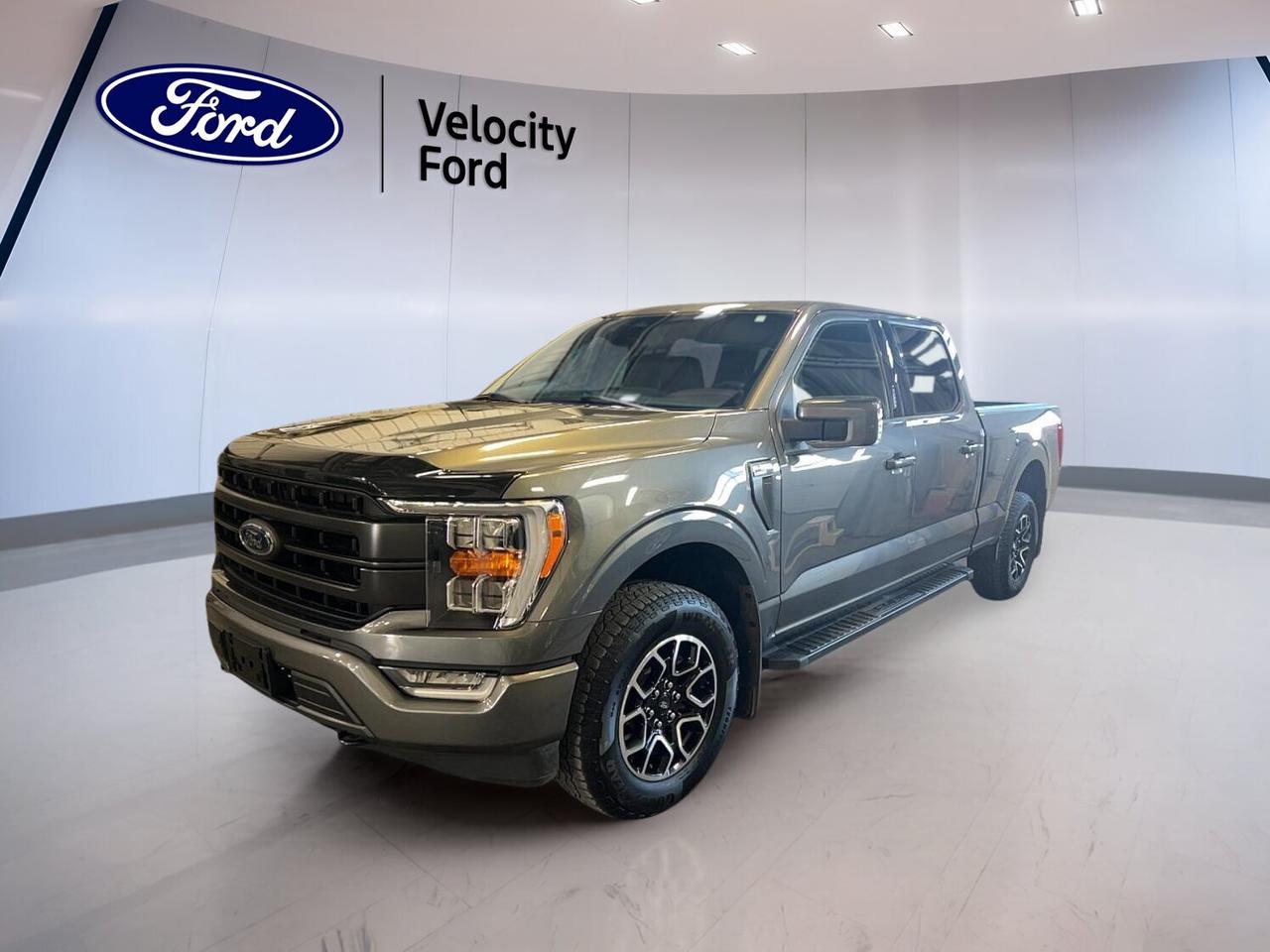 Built for work, travel, and weekend fun, this used 2022 Ford F-150 LARIAT 4WD SuperCrew 6.5 Box with Sport, FX4, & Trailer Tow Pkg delivers strong V8 power, a roomy four-door cabin, and proven truck capability. Finished in Grey with a Black interior, it has 39,665 km and is ready for life in Moose Jaw.

FEATURES OF THE F-150 LARIAT 4WD SuperCrew 6.5 Box With Sport, FX4, & Trailer Tow Pkg
»» Sport appearance adds bold, clean styling
»» FX4 package supports off-road confidence
»» Trailer Tow package boosts towing readiness
»» 6.5-foot box adds useful bed length

ADVANCED SAFETY FEATURES
»» Backup camera helps with tight parking
»» Blind spot monitor adds lane awareness
»» Lane departure warning supports safer travel
»» Side and head airbags enhance protection

PERFORMANCE AND EFFICIENCY
»» 5.0-litre V8 delivers strong output
»» Automatic transmission shifts smoothly every drive
»» Four-wheel drive adds year-round traction
»» Off-road tires support rougher terrain

COMFORT AND CONVENIENCE
»» Heated front seats add cold-weather comfort
»» Dual-zone climate control keeps temperatures balanced
»» Remote starter helps in winter mornings
»» Power seats include memory settings

TECHNOLOGY AND CONNECTIVITY
»» Navigation system helps guide every trip
»» Bluetooth integration supports hands-free calling
»» Wi-Fi hotspot keeps devices connected
»» Steering wheel audio controls add ease

TRUCK FEATURES
»» Towing capacity reaches 4,671 kg
»» Rear tow hook supports truck utility
»» Retractable mirrors help when towing
»» SuperCrew cab adds passenger space

CARGO SPACE
»» 6.5-foot box handles larger loads
»» Four-door cab stores gear with ease
»» Spare tire adds peace of mind
»» Rear access supports daily practicality

AWARDS & RECOGNITIONS
»» North American Truck of the Year, 2021
»» Vincentric Best Value in Canada, 2022

WHAT OTHER OWNERS LIKE
»» Strong V8 power for daily hauling
»» Spacious cabin for family and work
»» Easy towing confidence with stable handling
»» Useful tech that feels simple

This 2022 Ford F-150 LARIAT 4WD SuperCrew 6.5 Box with Sport, FX4, & Trailer Tow Pkg brings together full-size strength and upscale comfort in one smart package. The Grey exterior looks clean and modern, while the Black interior gives the cabin a refined and practical feel for daily use.

This truck is equipped with key features drivers want most, including cruise control, power steering, anti-lock braking system, stability control, child safety locks, heated and power mirrors, power windows, front air conditioning, tinted windows, satellite radio, HD Radio, fog lights, LED headlamps, and a rear window defroster.

You also get welcome convenience from push button start, adjustable pedals, an auto-dimming rearview mirror, automatic headlights, automatic door locks, tire pressure monitoring, turn signal mirrors, and illuminated vanity mirrors. The cabin is designed to make long drives easier, with lumbar support for both front occupants and automatic climate control.

For drivers who want a truck that can tow with confidence, handle changing road conditions, and still feel comfortable every day, this Ford is an easy choice. The Trailer Tow package, FX4 package, four-wheel drive system, and strong 5.0-litre engine make it well suited for Saskatchewan roads, job sites, and recreation alike.

This 2022 Ford F-150 LARIAT 4WD SuperCrew 6.5 Box With Sport, FX4, & Trailer Tow Pkgs VIN is: 1FTFW1E56NKE13944.