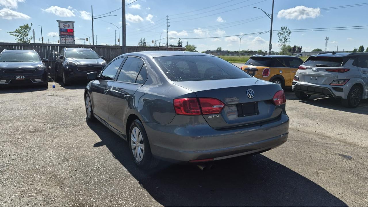 2013 Volkswagen Jetta Trendline+, SEDAN, AUTO, 4 CYL, AS IS SPECIAL Photo