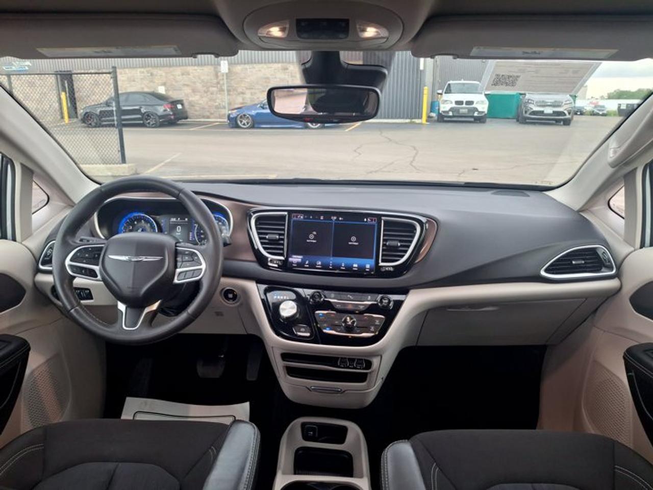 2024 Dodge Grand Caravan SXT | SafetyTec Group | GPS | Stow 'n Go | Heated Seats + Steering | Power Liftgate | and More ! Photo