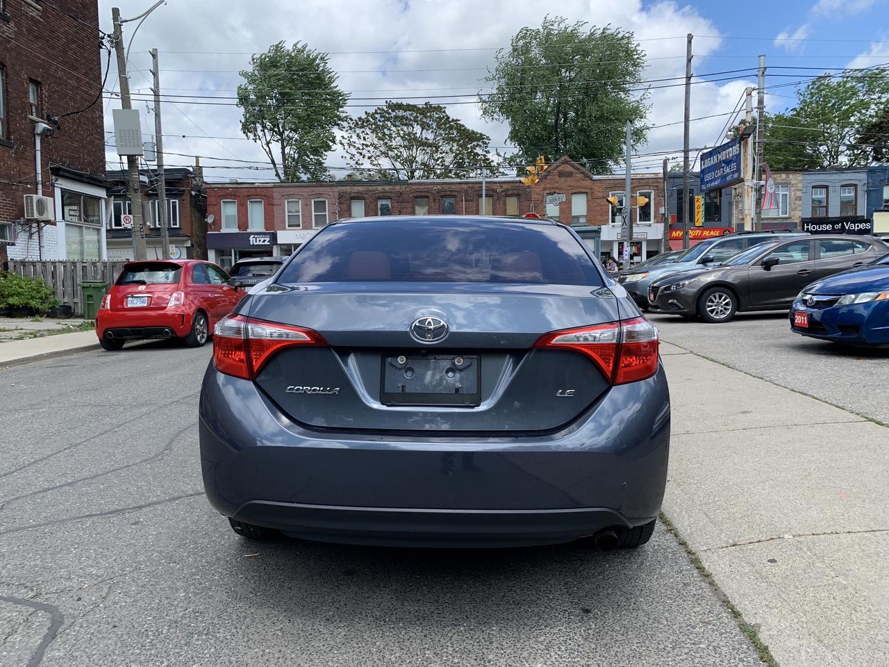 2014 Toyota Corolla 4dr Sdn CVT LE Photo