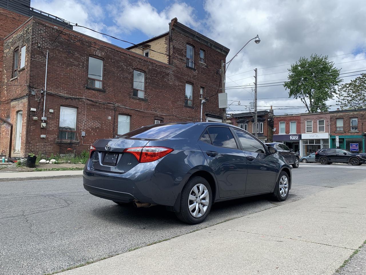 2014 Toyota Corolla 4dr Sdn CVT LE Photo