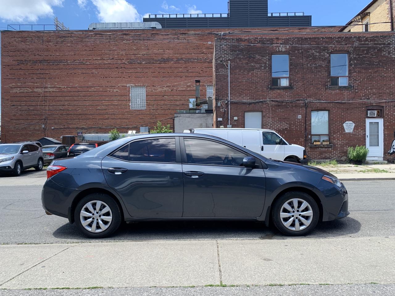 2014 Toyota Corolla 4dr Sdn CVT LE Photo