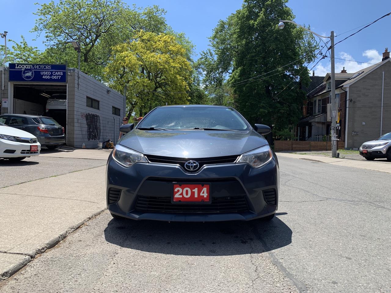 2014 Toyota Corolla 4dr Sdn CVT LE Photo