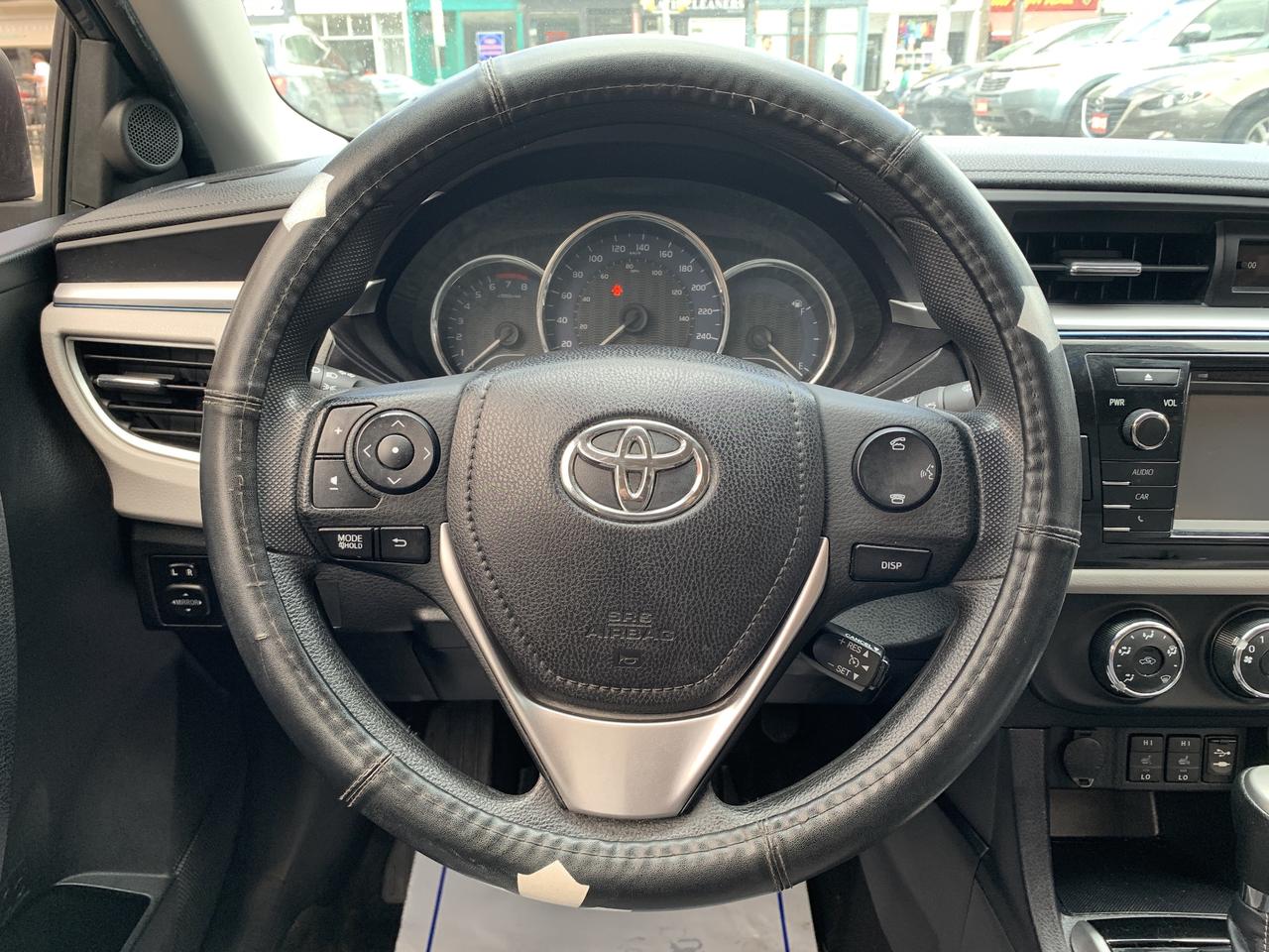 2014 Toyota Corolla 4dr Sdn CVT LE Photo