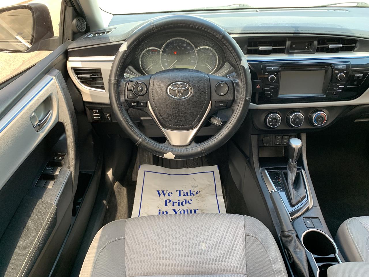 2014 Toyota Corolla 4dr Sdn CVT LE Photo
