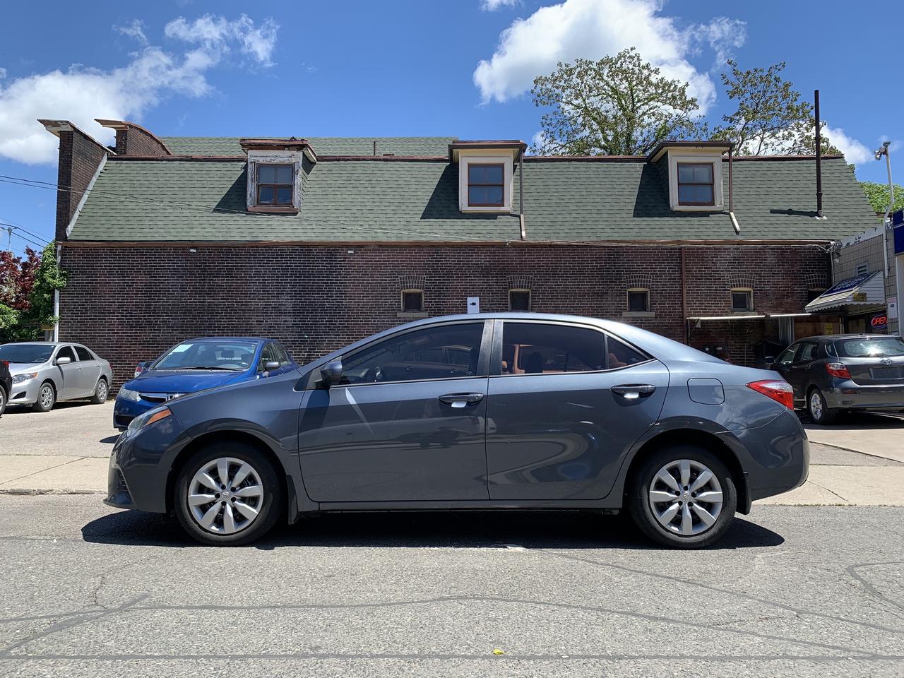 2014 Toyota Corolla 4dr Sdn CVT LE Photo