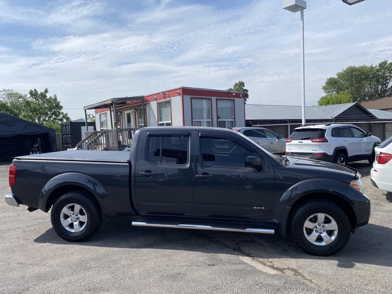 2013 Nissan Frontier 4WD Crew CAB LWB Auto SV Photo