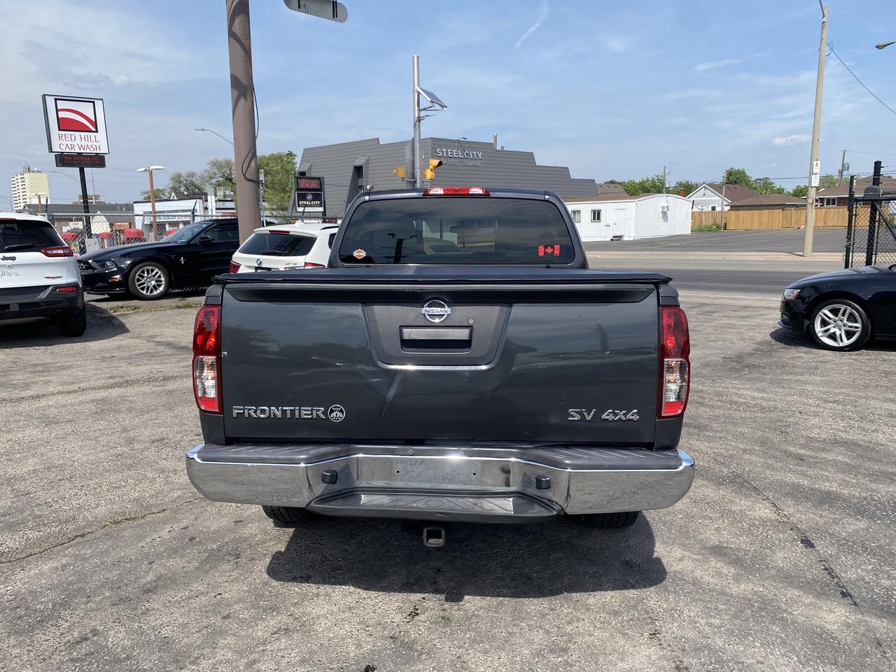 2013 Nissan Frontier 4WD Crew CAB LWB Auto SV Photo3