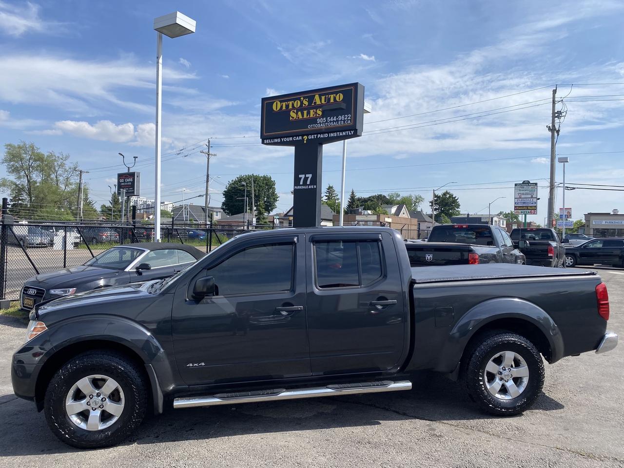 2013 Nissan Frontier 4WD Crew CAB LWB Auto SV Photo