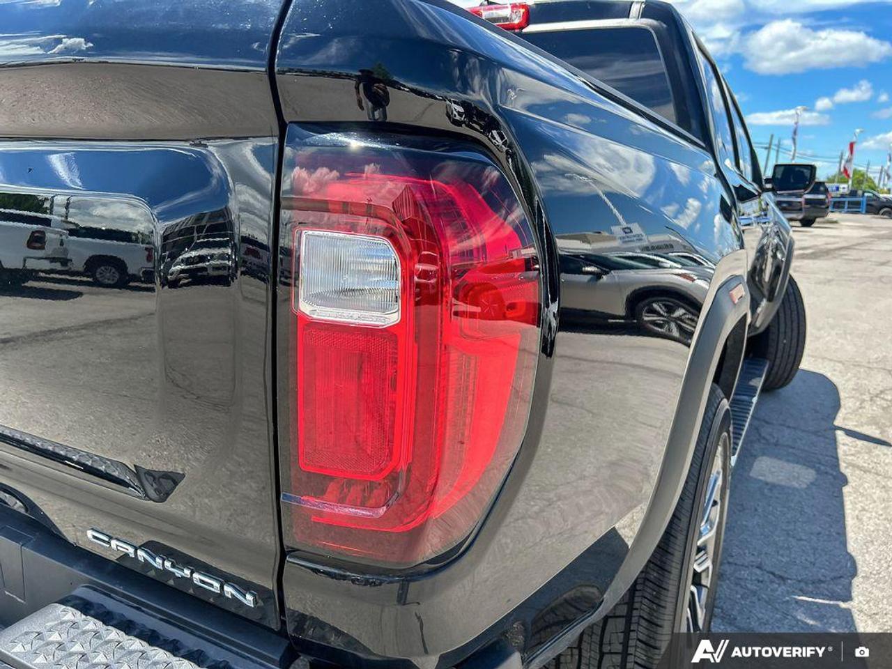 2024 GMC Canyon Denali PROGRADE TRAILERING PKG | HARD FOLDING TONNEAU COV Photo
