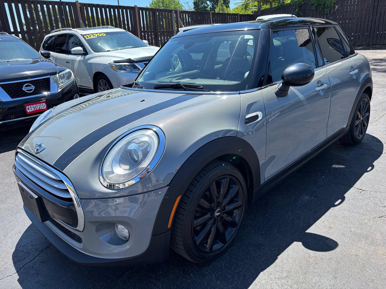 <p>Very well equipped 2015 Mini 4 door hardtop with a 6 speed manual and the fuel efficient 3 cylinder twin power turbo engine. Optioned with 17 alloy wheels, leather interior, panoramic roof, navigation, premium audio, keyless entry, push button start and bluetooth.</p><p>Just serviced and detailed. Accident free and well maintained.</p><p>$8900 certified plus HST and licencing.&nbsp;</p><p>Warranty plans available at additional cost.</p>