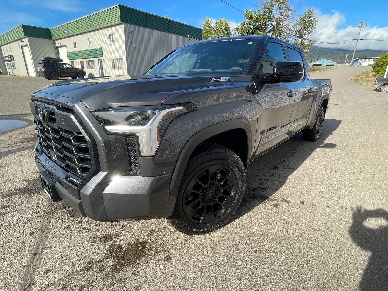 <p>Experience the future of trucking with the all-new 2026 Toyota Tundra LIMITED HYBRID, now available at Smithers Toyota. This isnt just a pickup truck; its a powerful, intelligent, and remarkably efficient machine designed to conquer any challenge you throw its way. From its robust hybrid powertrain to its premium interior and advanced safety features, the Tundra LIMITED HYBRID redefines what you can expect from a full-size truck. Whether youre hauling, towing, or embarking on your next adventure, this Tundra is engineered to perform with confidence and sophistication.</p><p>&nbsp;</p><p>Step inside the 2026 Tundra LIMITED HYBRID and discover a cabin crafted for comfort and convenience. The spacious interior boasts luxurious leather seating, dual-zone automatic climate control, and a premium sound system to elevate every drive. With advanced technology seamlessly integrated, including a state-of-the-art infotainment system with turn-by-turn navigation and real-time traffic updates, youll stay connected and informed on the go. Plus, with a suite of advanced safety features, including the Pre-Collision System and Blind Spot Monitor, you can drive with peace of mind, knowing the Tundra is looking out for you.</p><p>&nbsp;</p><p>Here are 5 features that truly make this 2026 Toyota Tundra LIMITED HYBRID sizzle:</p><p><br><br></p><ul><li><strong>i-FORCE MAX 3.4L Twin Turbo V6 Hybrid Powertrain:</strong> Unleash exhilarating performance and impressive efficiency with Toyotas cutting-edge hybrid system, delivering robust power for any task.</li></ul><p>&nbsp;</p><ul><li><strong>TRD Off Road Package:</strong> Conquer any terrain with confidence thanks to enhanced off-road capabilities, designed to tackle the toughest trails and adventures.</li></ul><p>&nbsp;</p><ul><li><strong>Express Open/Close Sliding and Tilting Glass Sunroof:</strong> Enjoy an open-air driving experience and breathtaking views with the expansive sunroof, adding a touch of luxury and freedom to your journeys.</li></ul><p>&nbsp;</p><ul><li><strong>Class IV Towing Equipment:</strong> Be ready for anything with a comprehensive towing package, including a hitch, brake controller, and trailer sway control, making hauling your gear a breeze.</li></ul><p>&nbsp;</p><ul><li><strong>Premium Leather Seating and Interior Trim:</strong> Indulge in the refined comfort of premium leather seats and sophisticated interior accents, creating a luxurious and inviting atmosphere for every occupant.</li></ul><p><br><br></p><p><strong><em>Powered by AutoIntelligence&trade;</em></strong></p><p>&nbsp;</p><p>Vehicle information has been generated using artificial intelligence and is provided for informational purposes only. While efforts are made to ensure accuracy, please confirm all details directly with the dealer.</p><p>&nbsp;</p>