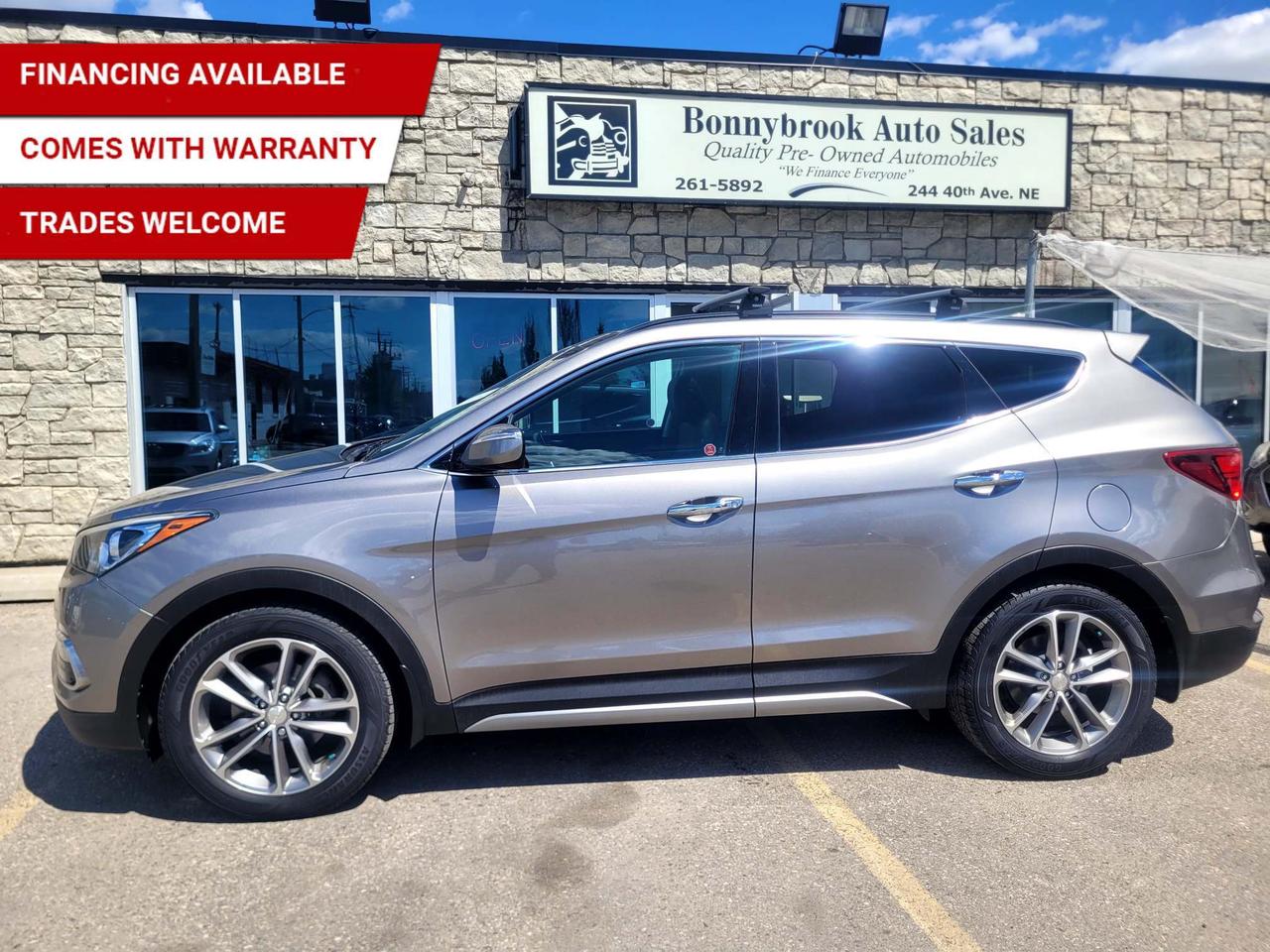 Need a vehicle that has style? Look at our Pre-Owned 2017 HYUNDAI SANTA FE  SPORT SE AWD (Pictured in photo) Filled with top options including: All wheel drive system, Heated Leather Seats, Keyless Entry, Panoramic Sunroof, Bluetooth, Power Mirrors,  Power Locks, Power Windows. Am/Fm stereo Cd player  Rearview camera Heated steering wheel/Air /Tilt /Cruise/ comes with 6 month power train warranty with options to extend. Smooth ride at a great price thats ready for your test drive. Fully inspected and given a clean bill of health by our technicians. Fully detailed on the interior and exterior so it feels like new to you. There should never be any surprises when buying a used car, thats why we share our Mechanical Fitness Assessment and Carfax with our customers, so you know what we know. Bonnybrook Auto sales is helping thousands find quality used vehicles at prices they can afford. If you would like to book a test drive, have questions about a vehicle or need information on finance rates, give our friendly staff a call today! Bonnybrook auto sales is proudly one of the few car dealerships that have been serving Calgary for over Twenty years. /TRADE INS WELCOMED/ Amvic Licensed Business.  Due to the recent increase for used vehicles.  Demand and sales combined with  the U.S exchange rate, a lot  vehicles are being exported to the U.S. We are in need of pre-owned vehicles. We give top dollar for your trades.  We also purchase all makes and models of vehicles.
