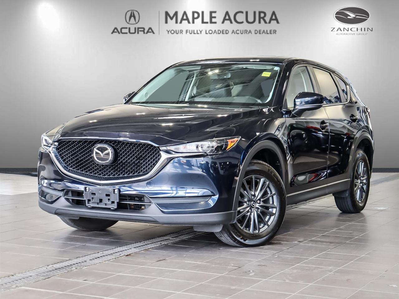 Bluetooth, Market Value Pricing, Not a Rental, Local Trade, 30 Day 1,000km safety related and 90 Day 5,000 km engine and transmission warranty, ** All vehicles are all in priced, No additional fees are applied., 6 Speakers, Auto-dimming Rear-View mirror, Brake assist, Dual front side impact airbags, Front Bucket Seats, Front reading lights, Leatherette Upholstery, Occupant sensing airbag, Passenger vanity mirror, Power windows, Radio: AM/FM/HD w/6 Speakers, Speed-sensing steering, Steering wheel mounted audio controls, Traction control, Wheels: 17 Alloy Dark Grey High Lustre Met Finish.

Recent Arrival! 2020 Mazda CX-5 GS
SKYACTIV&reg;-G 2.5L 4-Cylinder DOHC 16V 6-Speed Automatic AWD

Odometer is 18676 kilometers below market average!


** All vehicles are all in priced, No additional fees are applied. Buying an used vehicle from Maple Acura is always a safe investment. We know you want to be confident in your choice and we want you to be fully satisfied. Thats why ALL our used vehicles come with our limited warranty peace of mind package included in the price. No questions, no discussion - 30 days or 1,000 km safety related warranty 90 days or 5,000 kilometre powertrain coverage. From the day you pick up your new car you can rest assured that we have you covered.
Awards:
  * JD Power Automotive Performance, Execution and Layout (APEAL) Study
