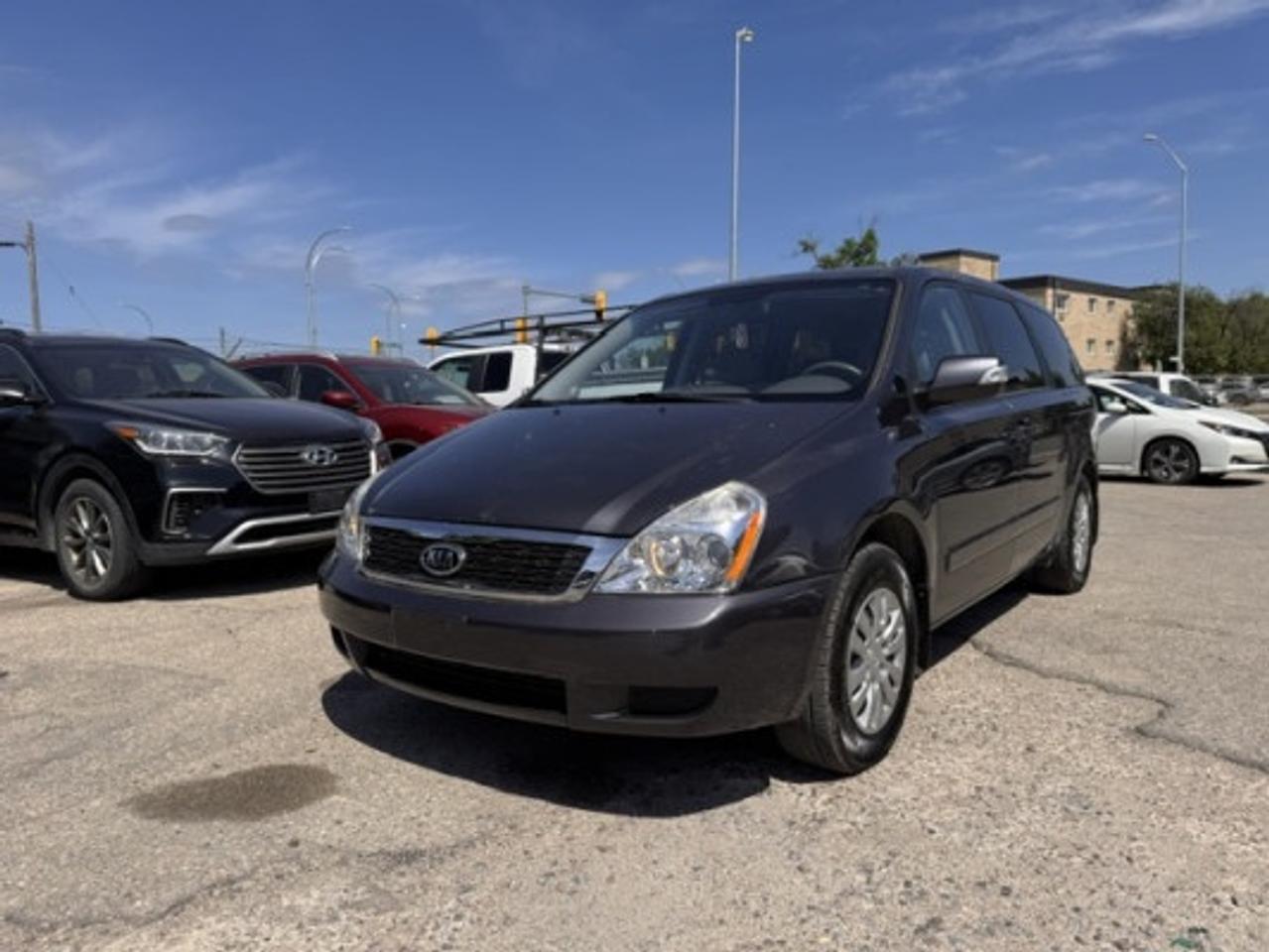 Used 2012 Kia Sedona LX Front-wheel Drive Passenger Van Automatic for sale in Winnipeg, MB