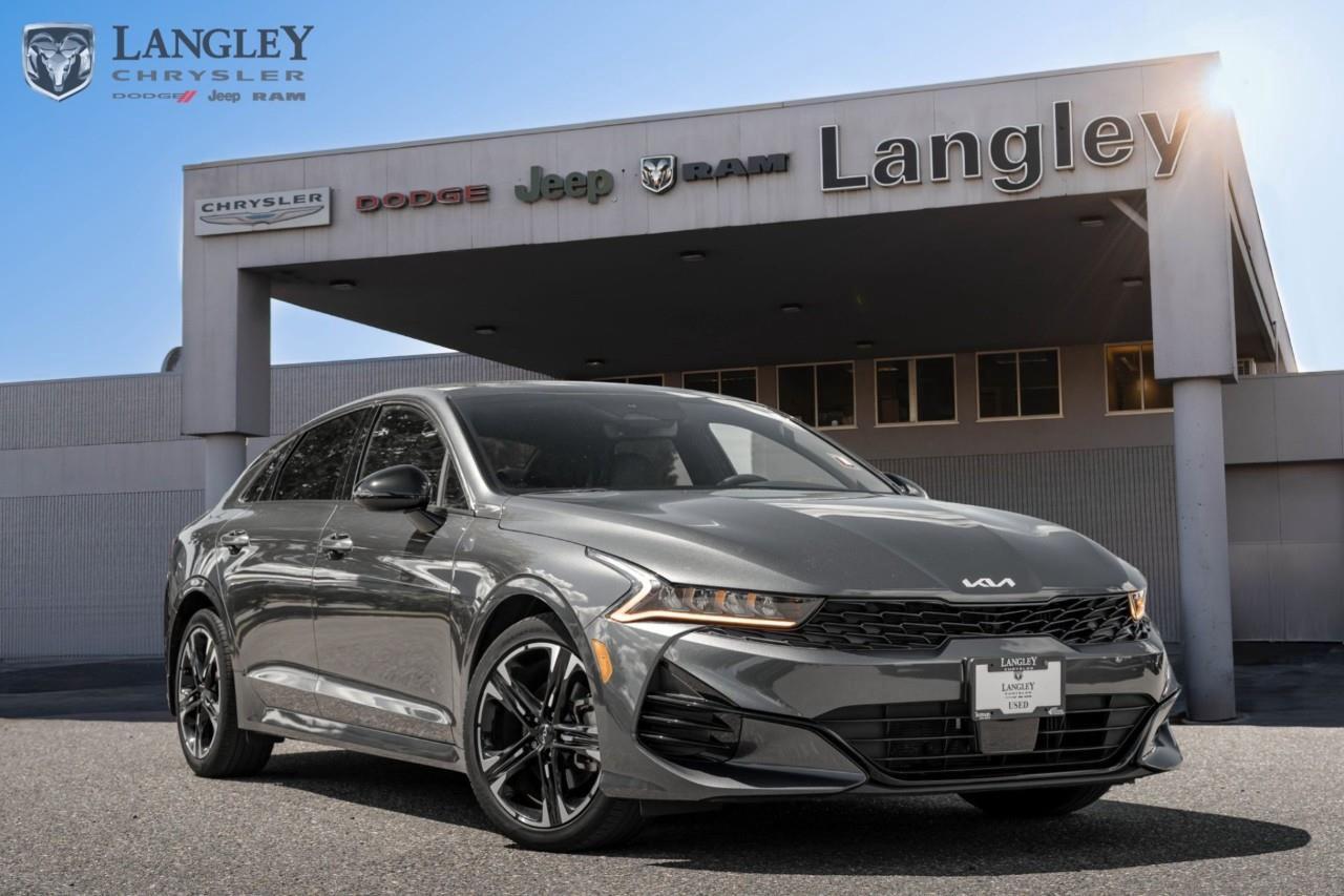 <p><strong>2023 Kia K5 GT-Line AWD</strong></p><p>The 2023 Kia K5 GT-Line AWD is a stylish and capable midsize sedan that combines sporty design elements with the all-weather traction of an intelligent all-wheel-drive system.</p><ul><li><p><strong>Engine:</strong> 1.6L Turbocharged 4-cylinder (180 hp, 195 lb-ft torque)</p></li><li><p><strong>Drivetrain:</strong> All-Wheel Drive (AWD) with Drive Mode Select (includes Snow Mode)</p></li><li><p><strong>Transmission:</strong> 8-speed automatic</p></li><li><p><strong>Infotainment:</strong> 10.25-inch touchscreen with navigation, Kia Connect, and wireless phone charging</p></li><li><p><strong>Interior Features:</strong> Cloth and SynTex seating trim, 10-way power drivers seat with power lumbar, heated front seats, and a heated steering wheel</p></li></ul><p>Come book a test drive at Langley Chrysler, conveniently located in Langley, British Columbia.</p>

<p>*All prices plus applicable taxes, applicable environmental recovery charges, documentation of $599 and full tank of fuel surcharge of $76 if a full tank is chosen. <br />Other protection items available that are not included in the above price:<br />Tire & Rim Protection and Key fob insurance starting from $599<br />Service contracts (extended warranties) for coverage up to 7 years and 200,000 kms starting from $599<br />Custom vehicle accessory packages, mudflaps and deflectors, tire and rim packages, lift kits, exhaust kits and tonneau covers, canopies and much more that can be added to your payment at time of purchase<br />Undercoating, rust modules, and full protection packages starting from $199<br />Financing Fee of $500 when applicable<br />Flexible life, disability and critical illness insurances to protect portions of or the entire length of vehicle loan</p>