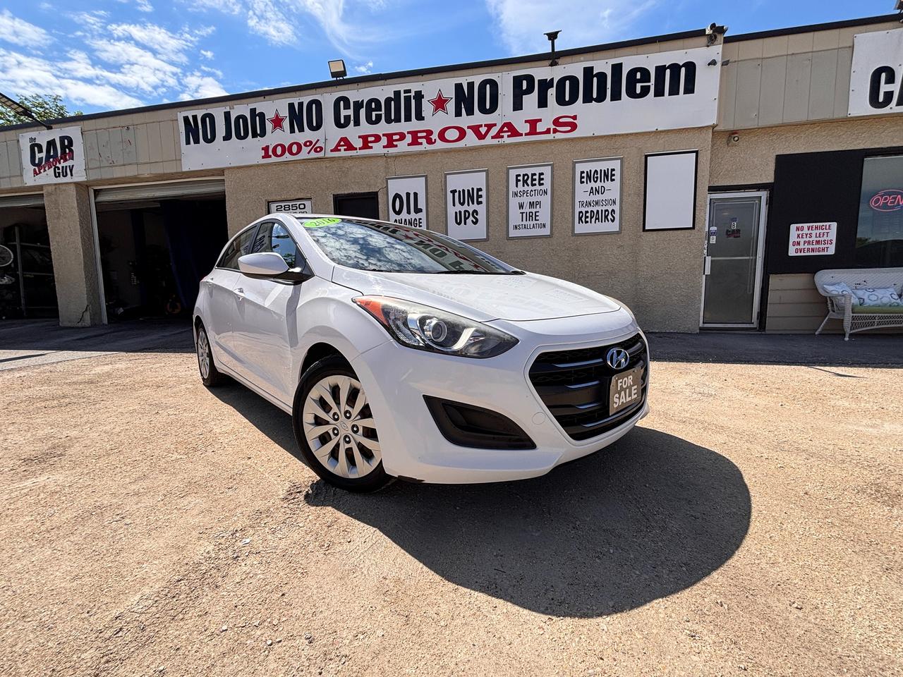 <p>🚗🔥 <strong>2016 Hyundai Elantra GT Hatchback &ndash; Manual Transmission | Fuel Efficient | Fun Daily Driver</strong> 🔥🚗</p><p>✔️ 5-Door Hatchback | ✔️ Manual Transmission | ✔️ Great on Fuel | ✔️ Affordable & Practical</p><p>📦 <strong>Stock #:</strong> GU272809<br>🔎 <strong>VIN #:</strong> KMHD25LH3GU272809<br>🏷️ <strong>Dealer#4660</strong></p><p>💰 <strong>Financing Available &ndash; ALL Credit Types Welcome!</strong><br>🔄 <strong>Trade-Ins Welcome!</strong></p><p>Looking for a vehicle that is affordable, reliable, and actually fun to drive? This <strong>2016 Hyundai Elantra GT Hatchback</strong> checks all the boxes.</p><p>Finished in a clean <strong>White exterior</strong>, this sporty hatchback offers excellent fuel economy, easy handling, and the added enjoyment of a <strong>manual transmission</strong>. Perfect for commuters, students, first-time buyers, or anyone wanting a practical vehicle without sacrificing driving enjoyment.</p><p>━━━━━━━━━━━━━━━━━━</p><p>⚙️ <strong>Vehicle Information</strong></p><p>&bull; 2.0L 4-Cylinder Engine<br>&bull; Manual Transmission<br>&bull; Front-Wheel Drive (FWD)<br>&bull; 5-Door Hatchback Design<br>&bull; White Exterior</p><p>━━━━━━━━━━━━━━━━━━</p><p>✨ <strong>Comfort & Interior Features</strong></p><p>✔️ Comfortable Cloth Seating<br>✔️ Spacious Hatchback Interior<br>✔️ Air Conditioning<br>✔️ Adjustable Steering Wheel<br>✔️ Folding Rear Seats for Extra Cargo Space<br>✔️ Practical Design for Everyday Use</p><p>━━━━━━━━━━━━━━━━━━</p><p>📱 <strong>Technology Features</strong></p><p>✔️ Bluetooth Connectivity<br>✔️ AM/FM Audio System<br>✔️ Cruise Control<br>✔️ Power Windows & Locks<br>✔️ Steering Wheel Controls</p><p>━━━━━━━━━━━━━━━━━━</p><p>🛡️ <strong>Safety & Capability</strong></p><p>✔️ Stability & Traction Control<br>✔️ ABS Braking System<br>✔️ Multiple Airbags<br>✔️ Compact & Easy-to-Drive Design<br>✔️ Great City & Highway Capability</p><p>━━━━━━━━━━━━━━━━━━</p><p>💎 <strong>Why Youll Love This Elantra GT</strong></p><p>⛽ Excellent fuel economy for daily driving<br>🏙️ Easy to park and perfect for city commuting<br>⚙️ Manual transmission for a fun driving experience<br>💰 Affordable ownership and practical design<br>🚗 A reliable hatchback ready for your everyday adventures</p><p>━━━━━━━━━━━━━━━━━━</p><p>📍 <strong>THE CAR GUY INC.</strong><br>2850 Dugald Road, Winnipeg, MB R2C 3Z5</p><p>📞 <strong>Office:</strong> 204-255-1297<br>☎️ <strong>Toll Free:</strong> 1-866-439-2295<br>📱 <strong>Call or Text Sales:</strong> 204-881-5932</p><p>🌐 <strong>Website:</strong> <a href=https://carguyinc.ca/>https://carguyinc.ca</a><br>📘 <strong>Facebook:</strong> The Car Guy Inc.<br>📸 <strong>Instagram:</strong> @thecarguyinc<br>🎵 <strong>TikTok:</strong> @thecarguyinc</p><p>🕒 <strong>Hours of Operation</strong><br>Monday&ndash;Friday: <strong>10:00 AM &ndash; 6:00 PM</strong><br>Saturday: <strong>10:00 AM &ndash; 5:00 PM</strong><br>Sunday: <strong>Closed</strong></p><p>🚨 <strong>Affordable, reliable, and fun to drive &mdash; this Elantra GT won&rsquo;t last long!</strong> Message us today, visit our dealership, or book your test drive before it&rsquo;s gone.</p><p>⚠️ <strong>IMPORTANT FEATURE DISCLAIMER</strong><br>Please note: The features listed above are auto-generated using the vehicle&rsquo;s VIN. While we strive for accuracy, actual features may vary by vehicle. Please confirm all details with the dealership, as the listed features are not guaranteed.</p>