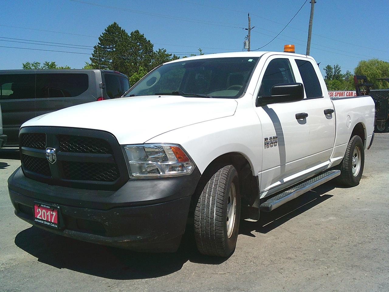 2017 RAM 1500 2WD Quad Cab 140.5  Tradesman Photo