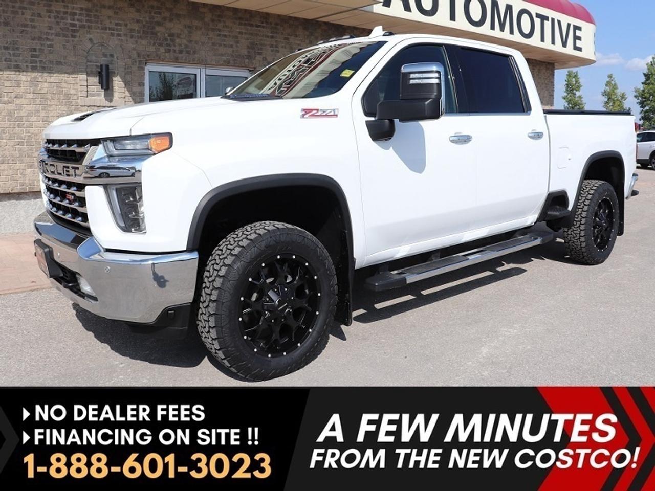 *** Dealer arranged financing on site! Quick, Simple,  no calls or waiting on bank appointments required!! Drive away today ***   NO ADMINISTRATION FEES!!

NOTE: Optional brand-new aftermarket tire and wheel package available for purchase if desired (pictured). Original tires and wheels come with vehicle at advertised price.

TOP OF THE LINE, 2021 Chevrolet SILVERADO 3500HD LTZ CREW 6.6L DURAMAX Z71 4X4, 10-SPEED ALLISON, FULLY LOADED, BEAUTIFUL CLEAN TRUCK - EXCEPTIONALLY CLEAN!!   

EXCEPTIONALLY CLEAN & VERY SHARP, WELL CARED FOR HWY DRIVEN WESTERN CANADIAN TRUCK! STUNNING AND COMPLETELY LOADED TOP OF THE LINE LTZ DURAMAX READY FOR WORK OR PLAY! 2021 CHEVROLET SILVERADO 3500HD LTZ CREW CAB Z71 4X4 EQUIPPED WITH THE PROVEN 6.6L DURAMAX DIESEL ENGINE & ALL NEW ALLISON 10-SPEED AUTOMATIC, LOADED WITH ALL OPTIONS, EXCEPTIONALLY CLEAN AND VERY WELL SERVICED, READY TO GO!

- 6.6L Duramax Diesel (making 445 horsepower and 910 lb-ft TQ)
- Auto 3 stage 4X4 incl AWD feature
- All New Allison 10-speed automatic
- Auto locking rear diff - REAR AXLE - 3.42 RATIO
- Traction Control
- STABILITRAK W/ TRAILER SWAY CONTROL & HILL START ASSIST
- Full Premium leather Heated and Cooled bucket seats with full center console
- Heated Steering Wheel
- Rear heated seats
- Heads-up display
- Two-way Power Sunroof
- Full drivers information center
- Large 8" MyLink Multimedia with BOSE Premium audio system with USB, AUX, and Satellite 
- Factory Bluetooth for phone and media 
- Android and Apple Carplay 
- 4G LTE Wi-Fi Hotspot 
- Factory Navigation
- Full HD surround vision, bedview camera, backup camera, hitch guidance and more
- Factory Remote Start 
- Remote Keyless entry & start 
- Dual Auto Climate Control Zones
- Rear Power sliding window
- Wireless Phone Charging
- Factory power converter 
- SAFETY PACKAGE 
- LANE CHANGE ALERT WITH SIDE  BLIND ZONE ALERT
- REAR CROSS-TRAFFIC ALERT
- HD Tow package with Exhaust Brake
- TRAILER TOWING PACKAGE WITH HITCH GUIDANCE
- Factory Brake Controller 
- Factory Big tow mirrors 
- Easy step rear bumpers 
- Chrome Appearance package
- Cab Lights
- Chrome Side Steps 
- OEM Fender moldings 
- Tow hooks
- Multi-flex/function tailgate
- Power Deployable rear gate on remote and dash 
- Brand new folding tonneau box cover
- Factory Chrome Running Boards
- Easy step rear bumpers
- Z71 Off Road Package with Skid Plates
- Upgraded and AVAILABLE for extra $$ Mayhem Rim and tire package with AMP TERRAIN PRO 20-inch tires (Pre-installed and a great deal with truck purchase inquire with sales!)
- Read below for more info... 

VERY CLEAN AND VERY WELL CARED FOR COMPLETED LOADED CHEVROLET 3500 LTZ WITH Z71 OFF ROAD PACKAGE!! VERY CLEAN HWY DRIVEN TRUCK AND IS EQUIPPED WITH ALL THE RIGHT PREMIUM OPTIONS MAKING FOR A GREAT PLEASURE OR WORK TRUCK WITH HEAVY DUTY GVW! STILL LIKE NEW INSIDE AND OUT AND FULLY LOADED UPTOWN TRUCK! 2021 CHEVROLET SILVERADO 3500HD LTZ CREW CAB Z71 4X4 EQUIPPED WITH THE PROVEN 6.6L DURAMAX DIESEL ENGINE (445HP / 910 lb-ft TQ) & ALL NEW ALLISON 10-SPEED AUTOMATIC, auto 4X4 with 2-speed transfer case, traction control. This truck is FULLY loaded included full leather interior with heated and cooled front bucket seating with Full size console, SUNROOF, HEADS-UP DISPLAY, Factory remote Start, along with deployable multifunction tailgate on the remote, air, tilt, cruise, PW, PL, remote entry, heavy duty tow package with factory Exhaust Brake and  brake controller, tow hooks, headlamps, premium big screen, Multi Media Premium BOSE stereo with MyLink infotainment including Apple Carplay and Android Projection, plus Sirius Satellite AUX and USB input, factory Bluetooth for phone and media, GM OnStar system with navigation, tinted glass, step up rear bumper, Factory side steps, box side step, soft open tailgate, factory spray in box liner, and so much more. This is a Gorgeous LOADED  TOP OF THE LINE truck that has a ton of options and amazing looks for all your work or pleasure needs, that you must see and drive!!

Comes with a Manitoba Safety Certification, and we have many Extended Powertrain warranties available on your vehicle purchase up to 10-year coverage (on eligible vehicles see dealer for details). Financing on site with Zero down financing OAC. Trades accepted. View at Winnipeg West Automotive Group, 5195 Portage Ave. (only a couple of minutes past the new Costco) Dealer permit # 6007.  This Car is located in Winnipeg Manitoba,  however we can have it shipped anywhere in North America relatively inexpensively.