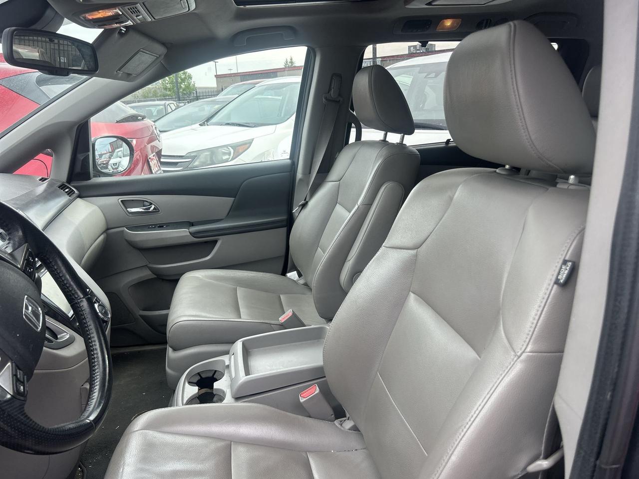 2014 Honda Odyssey 4dr Wgn Touring w-RES & Navi Photo