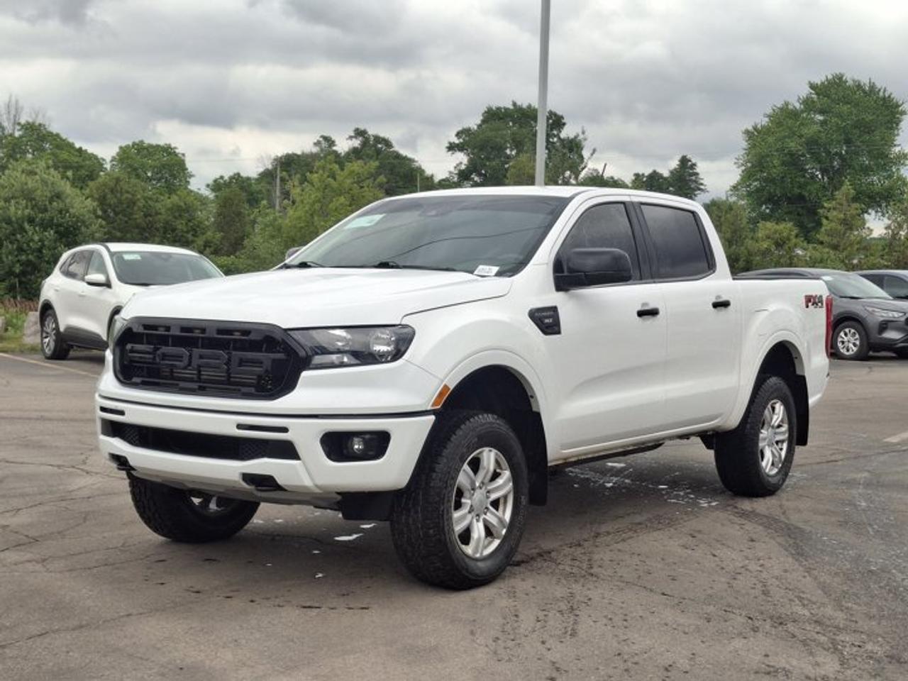 Look at this certified 2020 Ford Ranger XLT Crew 4WD | FX4 | CarPlay + Android | Rear Camera | and More !. Its Automatic transmission and 2.3 L engine will keep you going. This Ford Ranger features the following options: Reverse Camera, Air Conditioning, 4WD, Tilt Steering Wheel, Steering Radio Controls, Power Windows, Power Locks, Traction Control, Power Mirrors, and Android Auto / Apple CarPlay. Test drive this vehicle at Mark Wilsons Better Used Cars, 5055 Whitelaw Road, Guelph, ON N1H 6J4.MASSIVE SELECTION: 500+ vehicles in ONE LOCATION, all Live Market Priced for the best value!STRAIGHTFORWARD & TRANSPARENT PRICING: Our Advertised Price INCLUDES:Safety Certification! (No separate certification fee upcharge).FREE Carfax History Report!NO upcharge for paying cash!CONFIDENCE & PEACE OF MIND: 30-Day/3,000 km Warranty INCLUDED! Plus a 5-Day Exchange Privilege!*EASY FINANCING: Better-than-bank rates, $0 Down, and 3 Months No Payments available OAC. BAD CREDIT APPROVED HERE!WE BUY CARS: Get Top Dollar for your trade, or sell us your vehicle for CASH even if you dont buy ours!www.shopwilsons.comAn Honest, Transparent Buying Experience. Trusted in business since 1961!(Cash Prices Exclude HST and Licensing Fees only.)