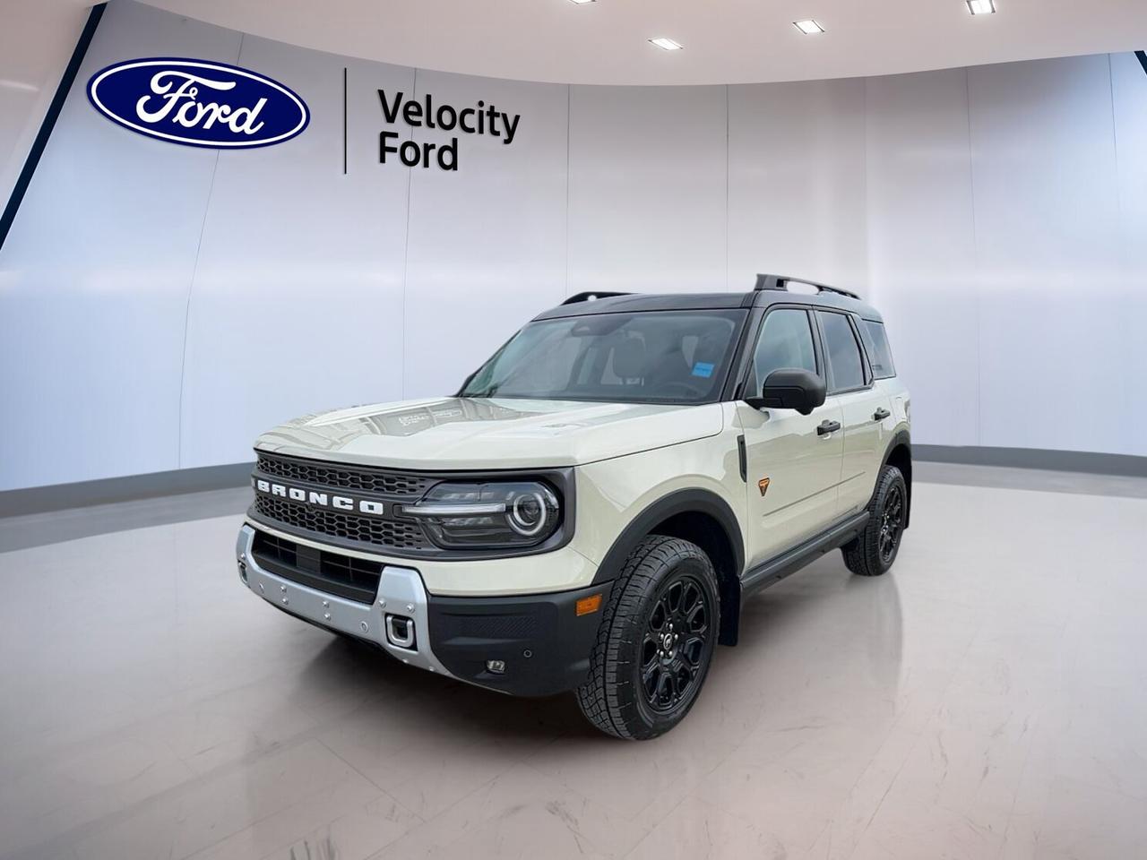 // ACCIDENT FREE!! //

Built for drivers who want real capability, this used 2025 Ford Bronco Sport Badlands 4x4 is ready for Saskatchewan roads, trails, and changing weather. Offered by Velocity Ford in Moose Jaw, it has just 18,605 km, a Desert Sand exterior, Grey interior, four doors, and a 2.0-litre unleaded engine with automatic transmission. CARFAX Canada reports no accident.

The 2025 Ford Bronco Sport Badlands 4x4 stands out with rugged engineering, confident four-wheel drive traction, and practical everyday comfort. This SUV blends off-road focus with smart safety, useful cabin features, and strong utility. It is a great fit for drivers who want a compact sport utility vehicle that feels ready for more.

FEATURES OF THE Bronco Sport Badlands 4x4
»» 2.0-litre engine delivers strong turbocharged performance
»» Four-wheel drive supports year-round traction
»» Off-road tires boost trail-ready capability
»» Rear tow hook adds extra recovery support

ADVANCED SAFETY FEATURES
»» Backup camera helps with tight parking
»» Blind spot monitor adds lane awareness
»» Lane departure warning supports safer travel
»» Side and head airbags enhance protection

PERFORMANCE AND EFFICIENCY
»» 2.0-litre unleaded engine offers solid power
»» Eight-speed automatic supports smooth shifting
»» Limited slip differential aids uneven surfaces
»» Stability control helps maintain driver confidence

COMFORT AND CONVENIENCE
»» Heated front seats add cold-weather comfort
»» Dual-zone climate control improves cabin comfort
»» Remote starter helps on winter mornings
»» Power seats support easier driving position

TECHNOLOGY AND CONNECTIVITY
»» Bluetooth integration supports hands-free communication
»» Steering wheel audio controls aid convenience
»» Satellite radio expands entertainment choices
»» Push button start adds modern ease

CARGO SPACE
»» Rear trunk access helps daily loading
»» Spare tire adds peace of mind
»» Four-door layout improves passenger entry
»» Flexible SUV design suits active lifestyles

AWARDS & RECOGNITIONS
»» Top Safety Pick, Insurance Institute for Highway Safety, 2024

WHAT OTHER OWNERS LIKE
»» Strong turbo power for daily driving
»» Useful size for city and trails
»» Comfortable ride with capable four-wheel drive
»» Easy cargo flexibility for active weekends

This used SUV also adds helpful everyday details that drivers appreciate. Heated mirrors, electric mirrors, power windows, rear window defroster, fog lights, automatic headlights, LED headlamps, tinted windows, automatic door locks, tire pressure monitoring, and an auto-dimming rearview mirror all support a more convenient driving experience in every season.

Inside, the cabin is designed to make each trip easier. The 2025 Ford Bronco Sport Badlands 4x4 includes front air conditioning, automatic climate control, driver lumbar support, memory seats, memory mirrors, adjustable steering wheel, illuminated vanity mirrors, cruise control, and power steering. These features help create a comfortable and practical environment for commuting or weekend travel.

With low kilometres, accident-free CARFAX Canada history, and a well-equipped feature list, this 2025 Ford Bronco Sport Badlands 4x4 offers excellent value for drivers who want capability without giving up comfort. Visit Velocity Ford in Moose Jaw to see how this Bronco Sport fits your next adventure.

This 2025 Ford Bronco Sport Badlands 4x4s VIN is: 3FMCR9DA9SRE13236.