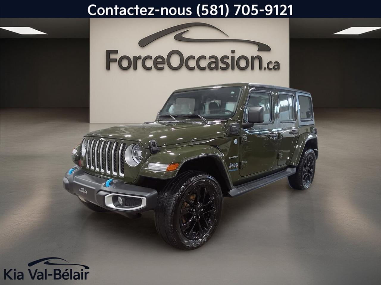 Jamais accidenté // Inspecté en 135 points

Le Jeep Wrangler 4xe 2022 UNLIMITED SAHARA * 4X4 * CUIR * TOIT * BI-ZONE * VOLANT CHAUFF * combine la liberté dun 4x4 et les avantages dun véhicule PHEV. Avec son moteur 2,0 litres hybride rechargeable, sa puissance combinée de 375 chevaux et son toit rigide convertible, il propose une conduite distinctive à Québec.

Wrangler 4xe UNLIMITED SAHARA * 4X4 * CUIR * TOIT * BI-ZONE * VOLANT CHAUFF *
»» Puissance combinée de 375 chevaux
»» Toit rigide convertible à 4 portes
»» Climatisation automatique à deux zones
»» Volant chauffant et marchepieds intégrés

CARACTÉRISTIQUES DU VÉHICULE PHEV
»» Motorisation hybride rechargeable 2,0 litres turbo
»» Autonomie électrique estimée jusquà 35 km
»» Batterie haute tension de 17 kWh
»» Conduite électrique, hybride ou eSave

CARACTÉRISTIQUES DE SÉCURITÉ AVANCÉES
»» Caméra de recul pour manoeuvres simplifiées
»» Coussins gonflables latéraux inclus
»» Contrôle de stabilité et système ABS
»» Surveillance de la pression des pneus

PERFORMANCE ET EFFICACITÉ
»» Transmission automatique à 8 vitesses
»» Traction intégrale 4x4 de série
»» Différentiel à glissement limité
»» Crochet de remorquage arrière installé

CONFORT
»» Sièges chauffants avant et volant chauffant
»» Climatisation avant avec réglage bi-zone
»» Démarrage par bouton-poussoir pratique
»» Support lombaire au siège conducteur

TECHNOLOGIE ET CONNECTIVITÉ
»» Intégration Bluetooth pour appels et audio
»» Système de navigation GPS intégré
»» Commandes audio directement au volant
»» Point daccès WiFi et radio satellite

ESPACE DE CHARGEMENT
»» Configuration 4 portes plus pratique
»» Accès au coffre arrière facilité
»» Banquette arrière utile au quotidien
»» Pneu de secours pour dépannage

RÉCOMPENSES ET RECONNAISSANCES
»» Meilleur VUS hybride rechargeable, Guide de lauto, 2022

APPRÉCIÉ DES AUTRES PROPRIÉTAIRES
»» Conduite silencieuse en mode électrique
»» Capacités 4x4 rassurantes toute lannée
»» Toit amovible apprécié en été
»» Réponse vive du groupe motopropulseur PHEV

Ce Jeep Wrangler 4xe 2022 UNLIMITED SAHARA * 4X4 * CUIR * TOIT * BI-ZONE * VOLANT CHAUFF * usagé affiche 77 821 km à lodomètre. Sa carrosserie verte, ses sièges en cuir noir, ses rétroviseurs chauffants, ses vitres teintées et ses phares à DEL ajoutent une présentation soignée et fonctionnelle.

Ce véhicule PHEV se distingue aussi par sa polyvalence. Il permet de faire de courts trajets en mode électrique, tout en conservant lautonomie globale dun moteur à essence pour les déplacements plus longs. Pour un acheteur qui veut un VUS 4x4 rechargeable sans sacrifier la capacité dutilisation au quotidien, cette configuration demeure très pertinente.

La présence de la direction assistée, du régulateur de vitesse, des vitres électriques, des rétroviseurs électriques, du rétroviseur intérieur électrochromatique et du verrouillage automatique des portes ajoute des fonctions utiles au quotidien. Les phares automatiques, les phares antibrouillard et le dégivreur de vitre arrière complètent bien léquipement pour le climat dici.

GARANTIE
»» Garantie légale seulement
»» Garantie dusage
»» Garantie de durée raisonnable
»» Garantie contre les vices cachés

Le Jeep Wrangler 4xe 2022 UNLIMITED SAHARA * 4X4 * CUIR * TOIT * BI-ZONE * VOLANT CHAUFF * vendu par Kia Val-Bélair à Québec propose une formule PHEV recherchée, un rouage 4x4, une présentation distinctive et des équipements concrets pour profiter de la route en toute saison.

Le NIV de ce Jeep Wrangler 4xe UNLIMITED SAHARA * 4X4 * CUIR * TOIT * BI-ZONE * VOLANT CHAUFF * 2022 est le 1C4JJXP67NW218008 .

Garantie prolongée disponible, livraison en 48h
