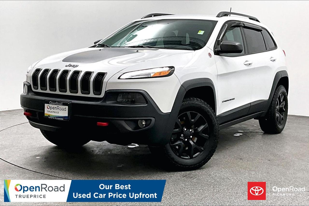 If you are looking for a rugged, highly capable SUV that can effortlessly transition from your daily city commute to the toughest weekend trails, this trail-ready 2017 Jeep Cherokee Trailhawk is the ultimate choice. Engineered with Jeeps legendary Active Drive Lock 4x4 system, a locking rear differential, an off-road suspension with a 1-inch factory lift, and heavy-duty skid plates, this vehicle is purpose-built to tackle deep snow, mud, and rocks with absolute confidence. Under the hood, the powerful 3.2L ActiveDrive V6 engine is paired with a smooth 9-speed automatic transmission, offering excellent towing capability and robust performance. Despite its tough exterior and signature red tow hooks, the Trailhawk interior keeps you in complete comfort with premium leather-trimmed performance seats, a heated steering wheel, heated front seats, and the award-winning 8.4-inch Uconnect touchscreen display featuring backup camera connectivity and satellite radio. Versatile, aggressively styled, and packed with intelligent Selec-Terrain drive modes, this clean-title, adventure-ready SUV is fully inspected and waiting for its next journey&mdash;message today to grab the keys!   "Buying a used car should be simple and stressfree  no guesswork, no negotiations  just the vehicles true price. Thats why were introducing OpenRoad TruePrice, a new way to buy used vehicles. One Price. TruePrice. Our best price upfront.   At Openroad Toyota RIchmond, we offer the best used car warranty in Metro Vancouver. Our used car warranty program includes 30 days or 2,000 kilometres Exchange Privilege, 90 Day Powertrain Coverage*, Mechanical & Safety Check of up to 210 Points and a clean title.    *90 Powertrain coverage will be offered at the discretion of management based on a case by case scenario."