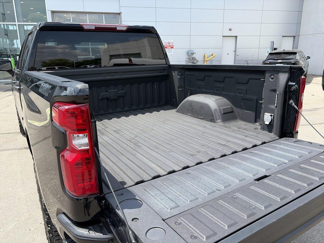 2024 Chevrolet Silverado 1500 Crew Cab Short Box 4-Wheel Drive Custom Trail Boss Photo