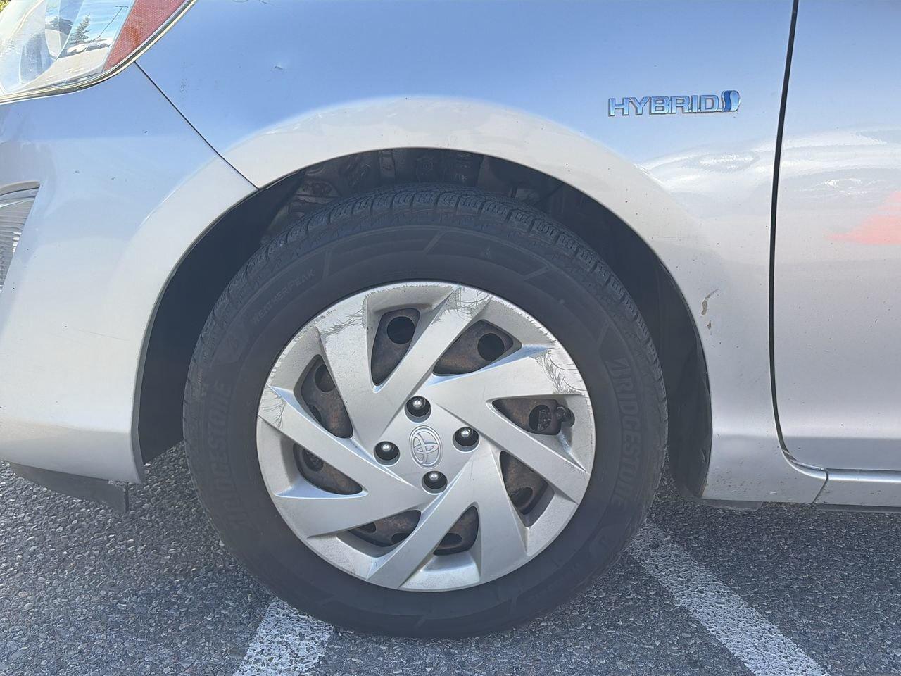 2015 Toyota Prius c eCVT SOLD AS/IS   CLOTH   BLUETOOTH CONNECTION Photo