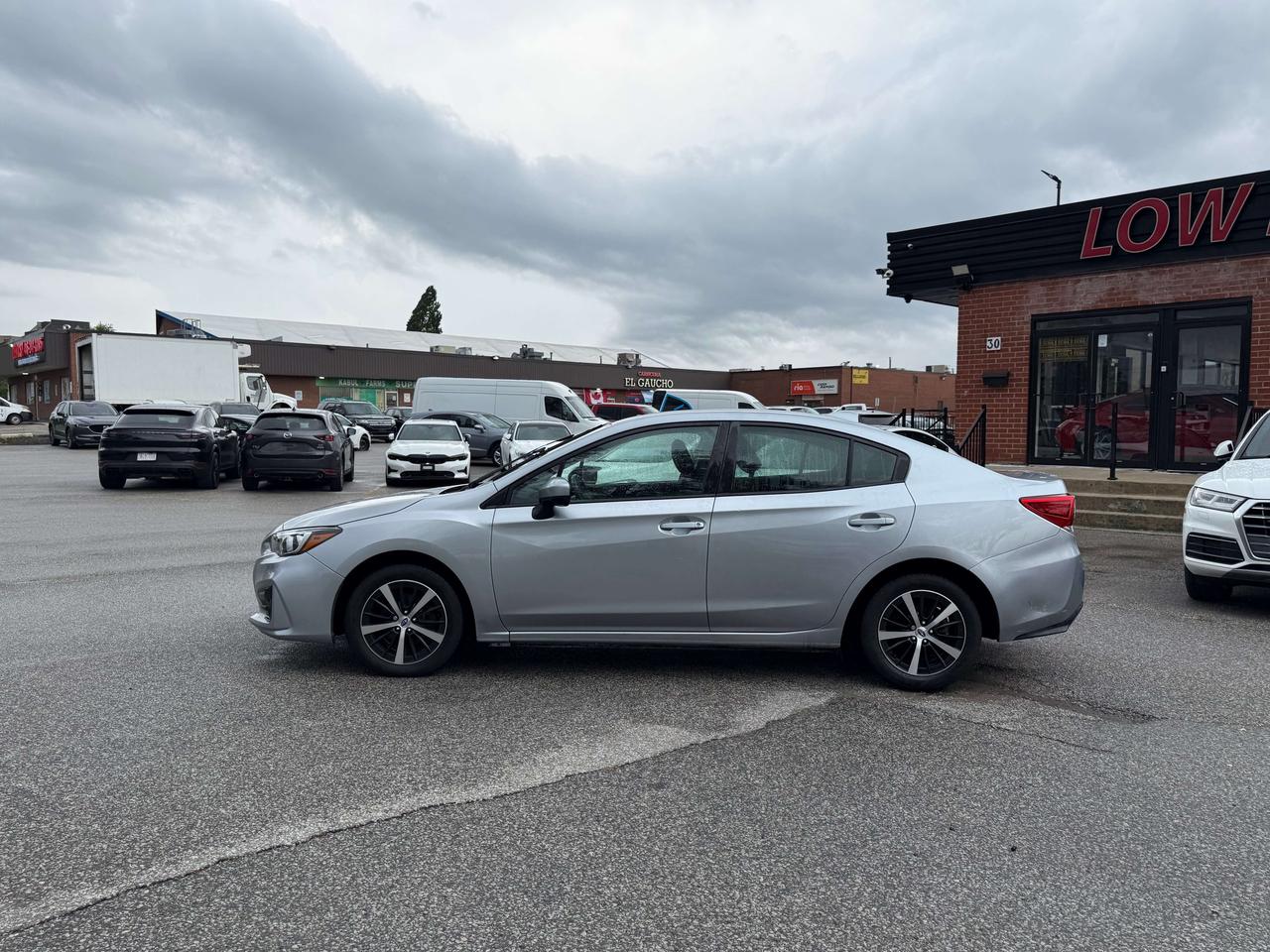 2019 Subaru Impreza Touring l AWD l 2.0 l 4Cyl l Auto l CarPlay Photo